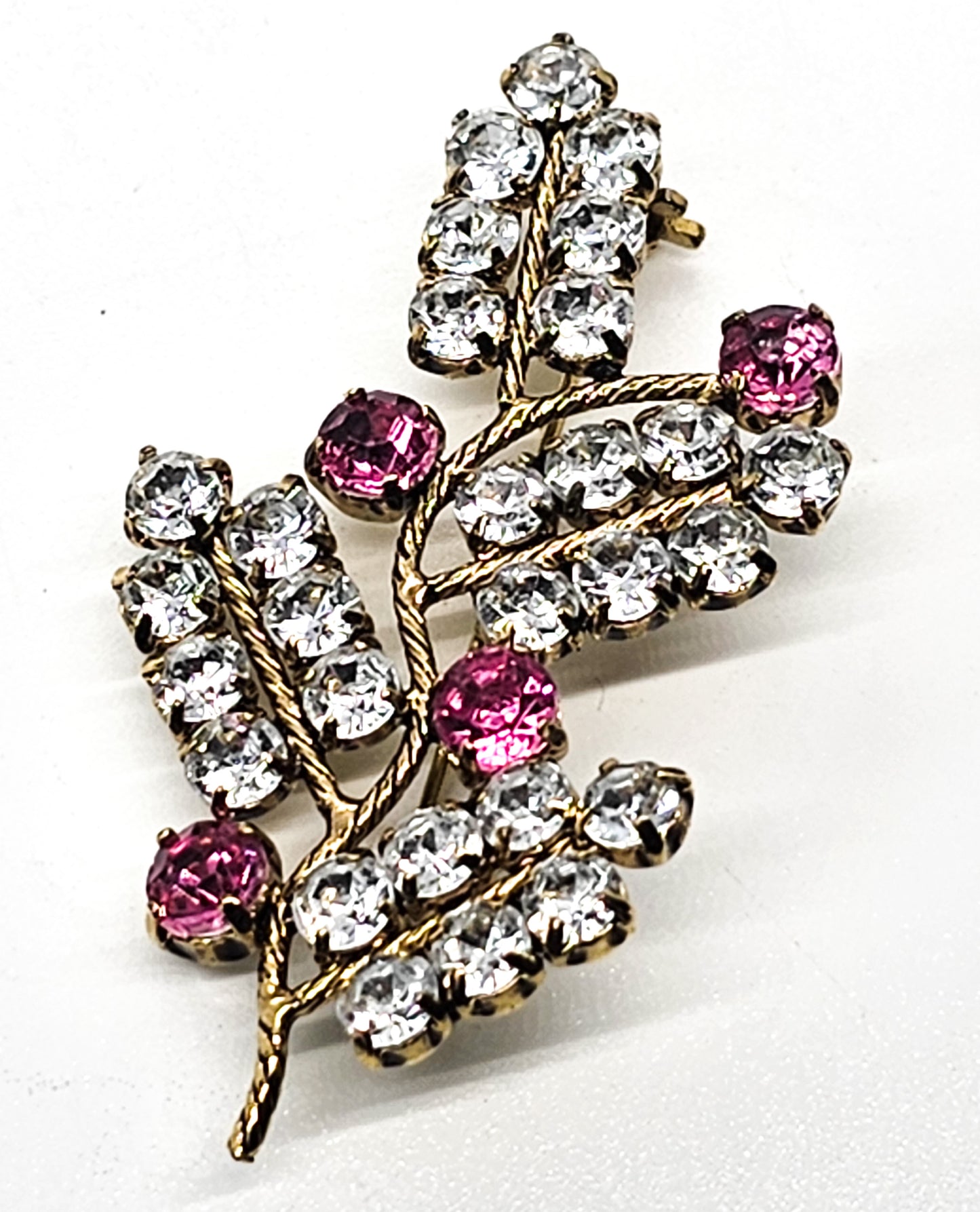Pink and white gold toned vintage sparkling rhinestone spray brooch
