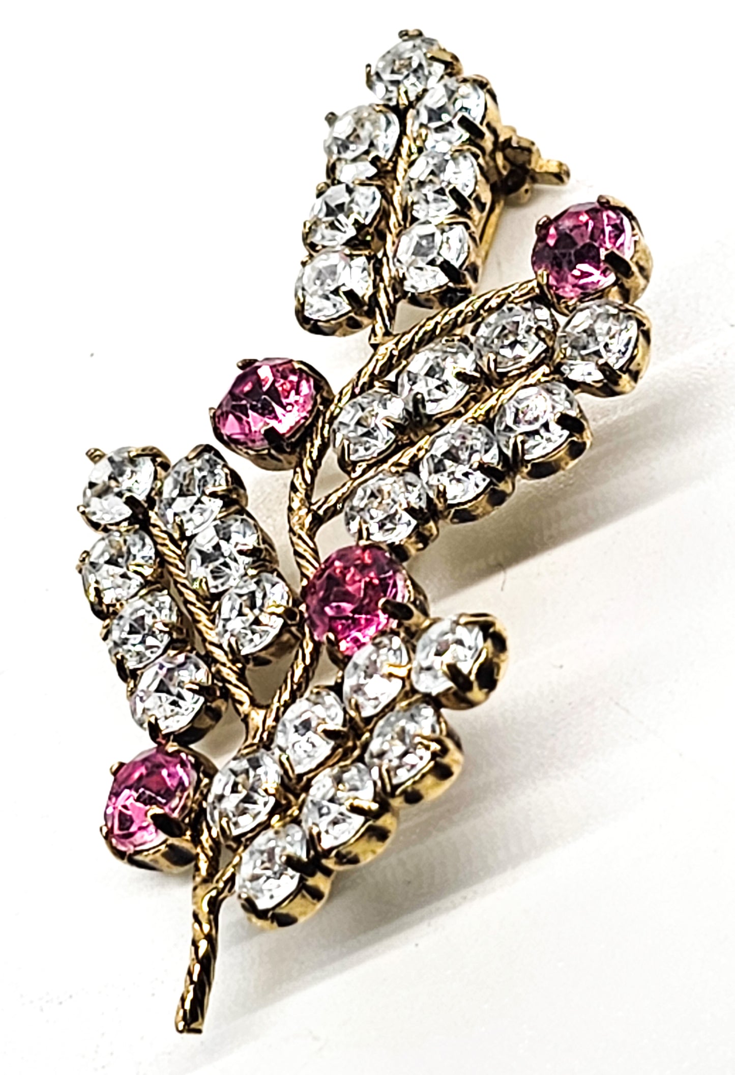 Pink and white gold toned vintage sparkling rhinestone spray brooch