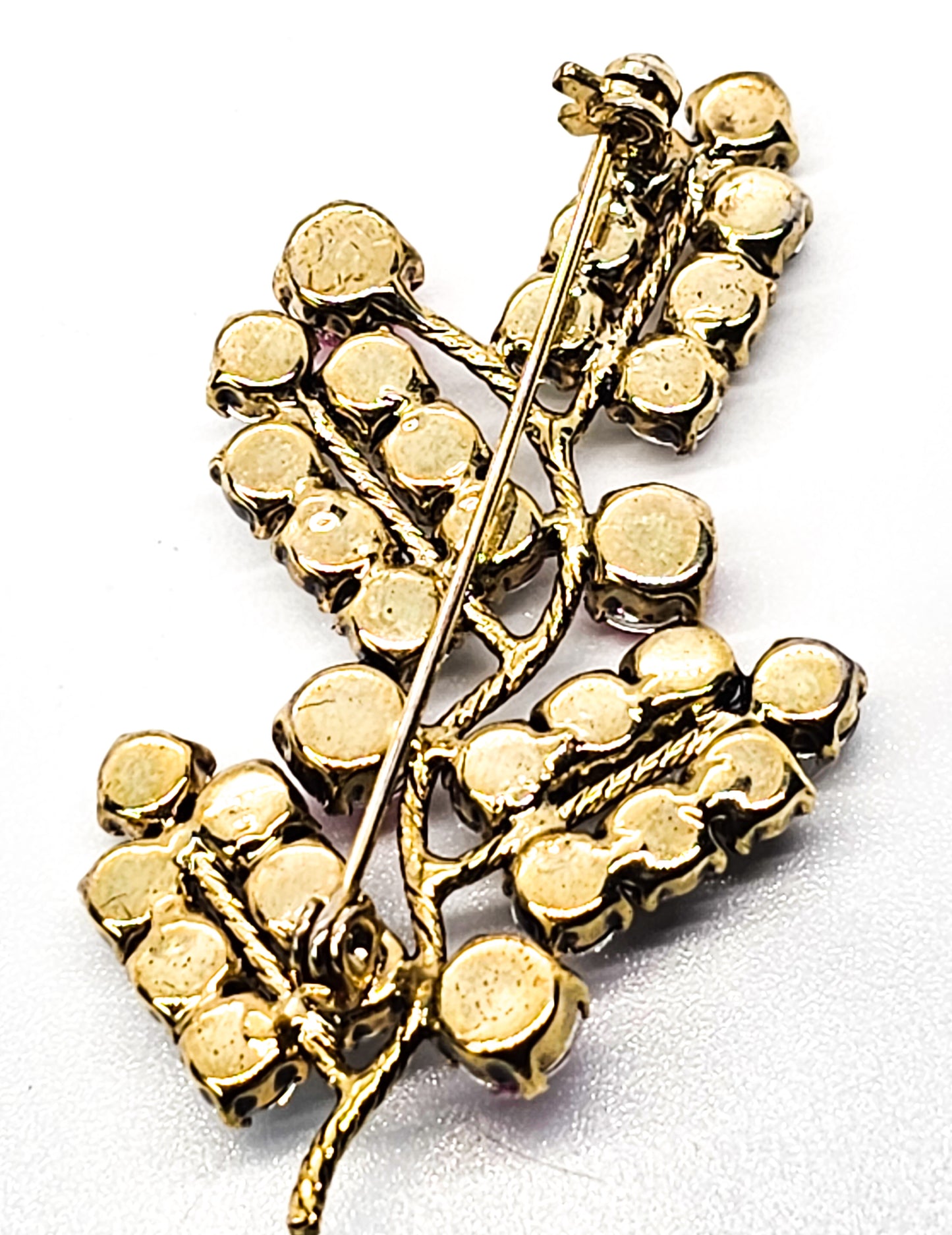 Pink and white gold toned vintage sparkling rhinestone spray brooch