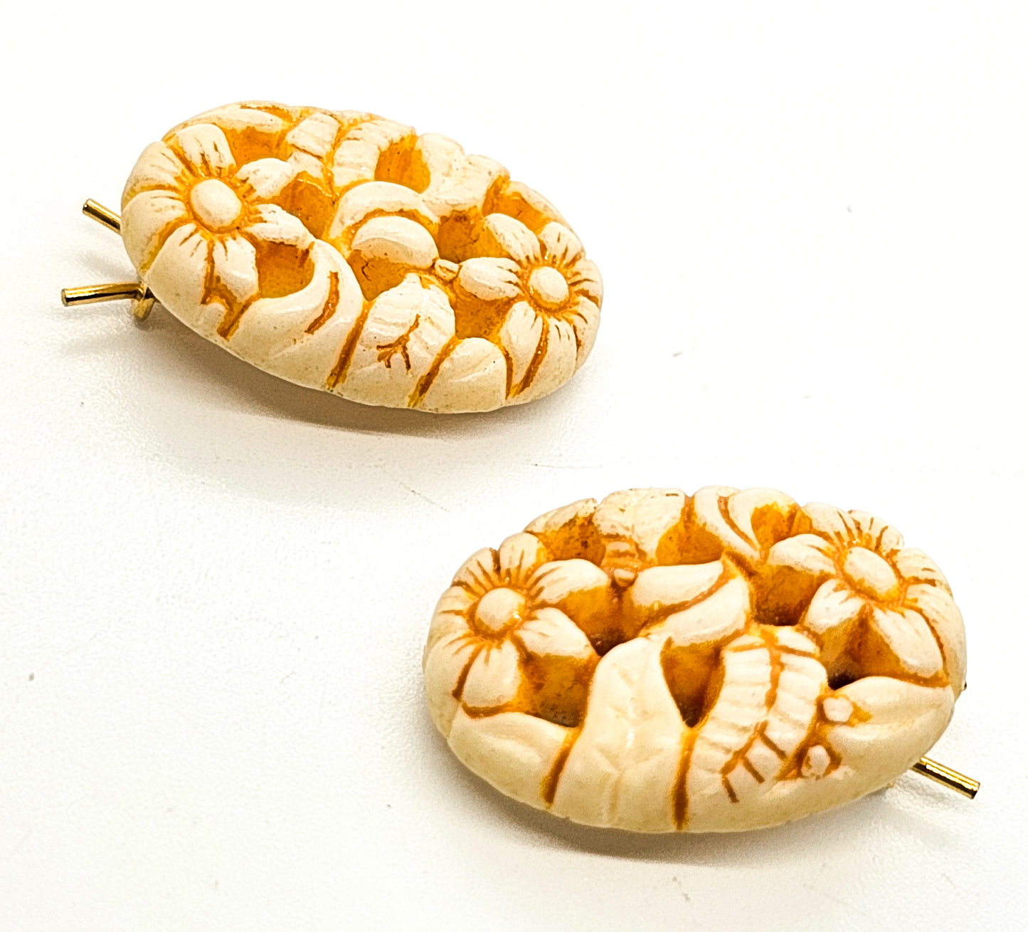 Molded pierced celluloid off-white flower pair of vintage barrettes mid century