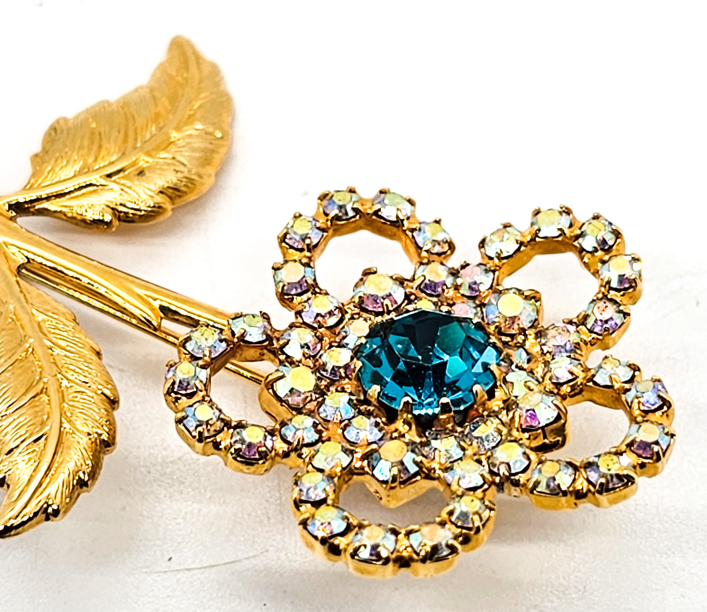 Aqua blue gold toned aurora borealis vintage daisy flower rhinestone brooch