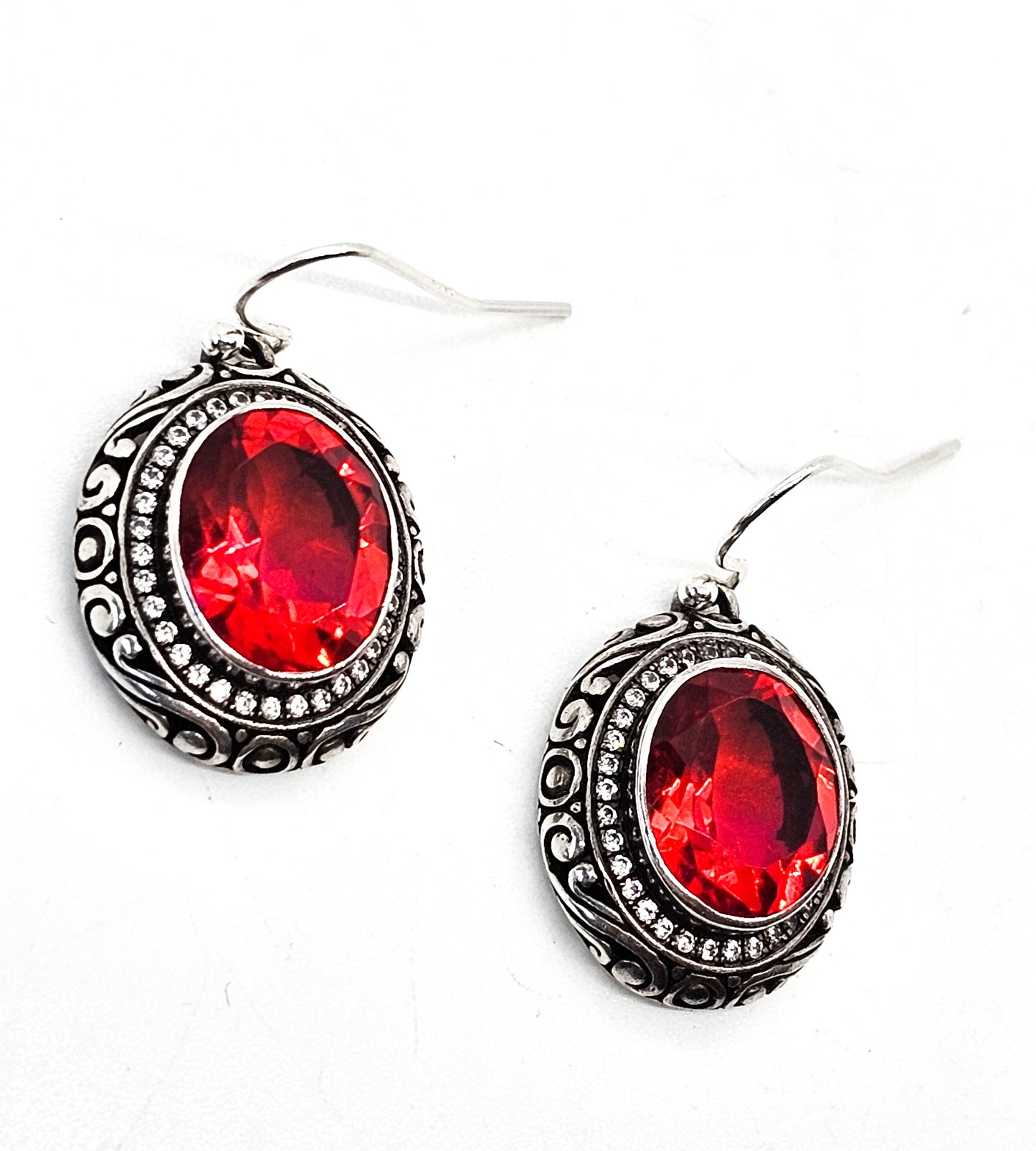 Balinese red faceted gemstone with Cubic Zirconia halo sterling silver earrings