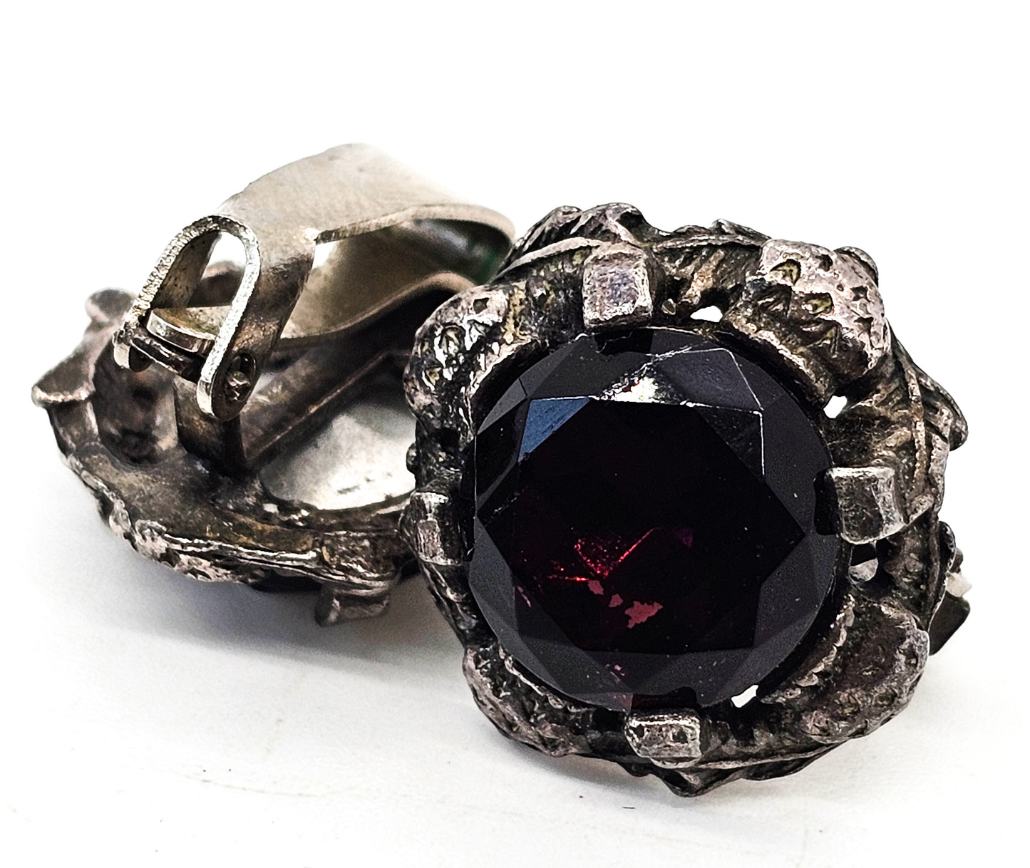 Deep purple glass silver toned Renaissance style vintage clip on earrings