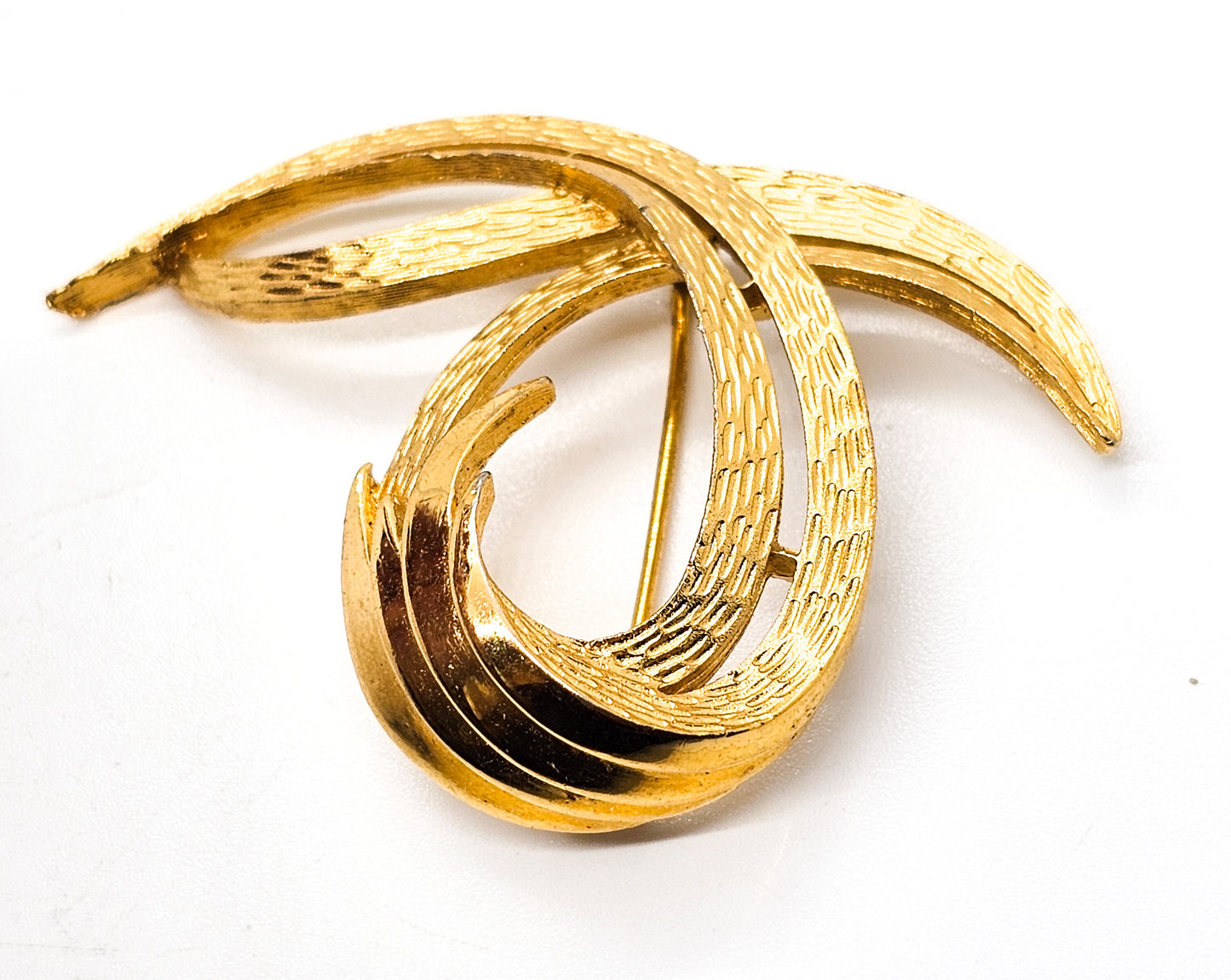 Crown Trifari vintage etched scroll swirl gold toned vintage signed brooch
