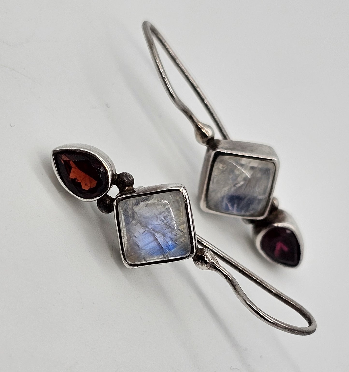 Princess cut blue flash moonstone and garnet tribal sterling silver earrings