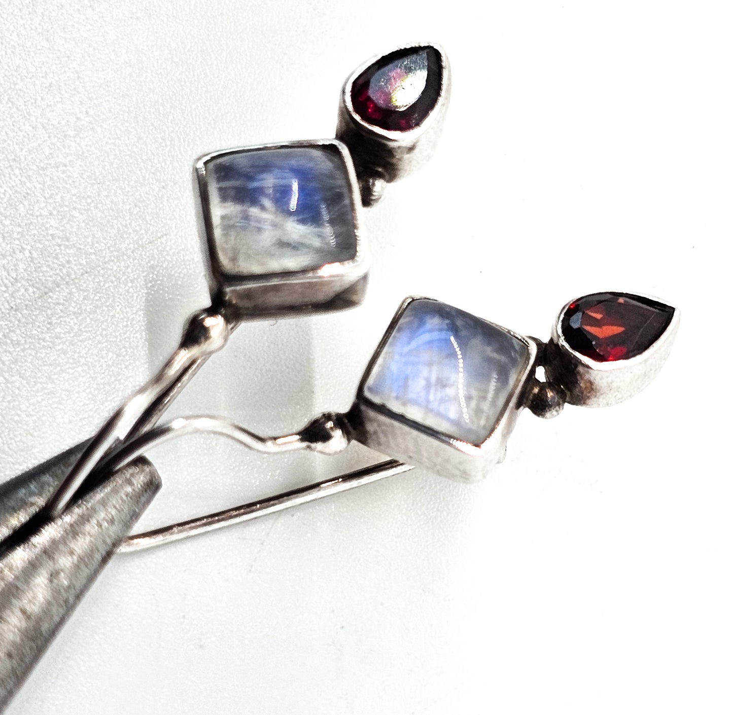 Princess cut blue flash moonstone and garnet tribal sterling silver earrings