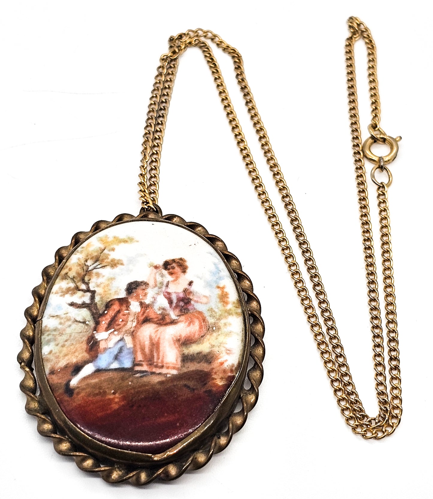 Painted Porcelain Courting Couple painted porcelain antique brass necklace