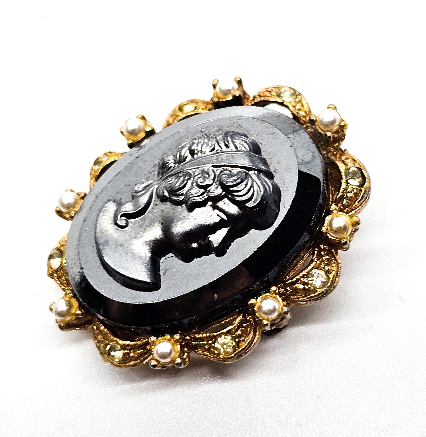 Carved Hematite cameo gold toned faux pearl and rhinestone vintage clasp brooch