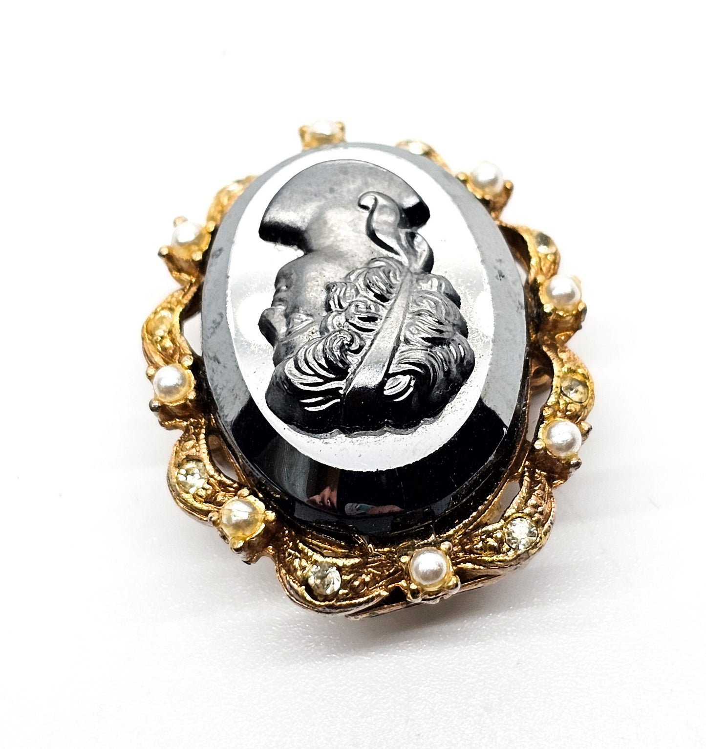 Carved Hematite cameo gold toned faux pearl and rhinestone vintage clasp brooch
