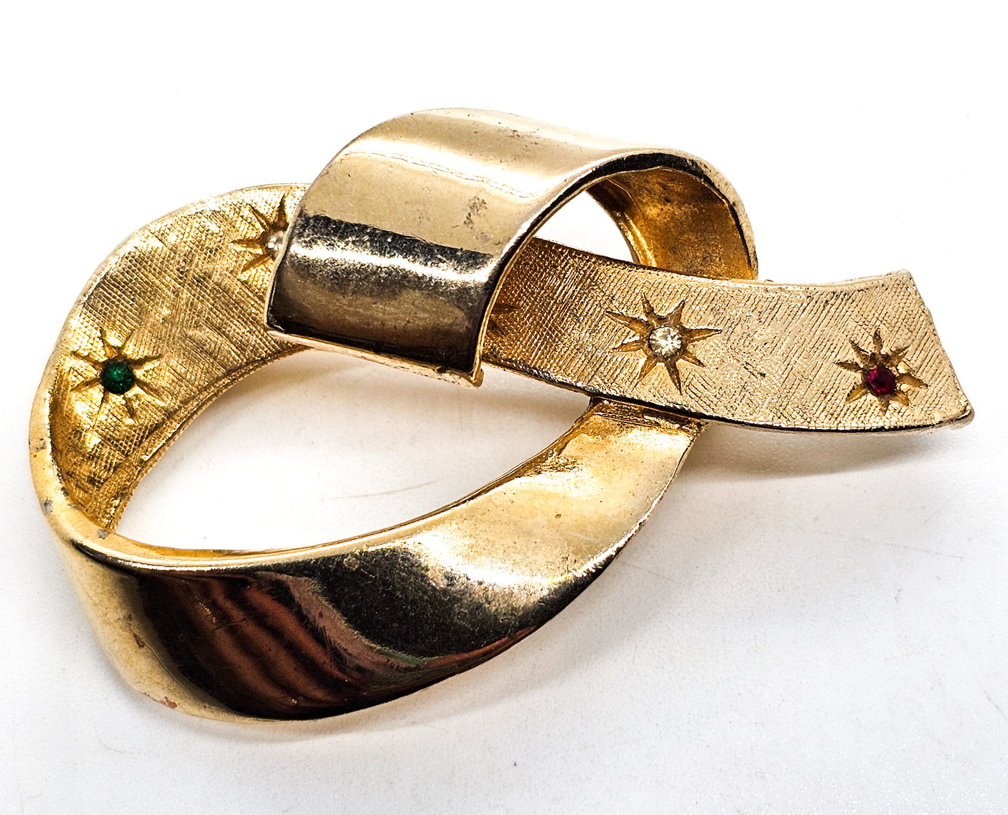 Accessocraft Holiday Gold ribbon with red, green and white rhinestone brooch