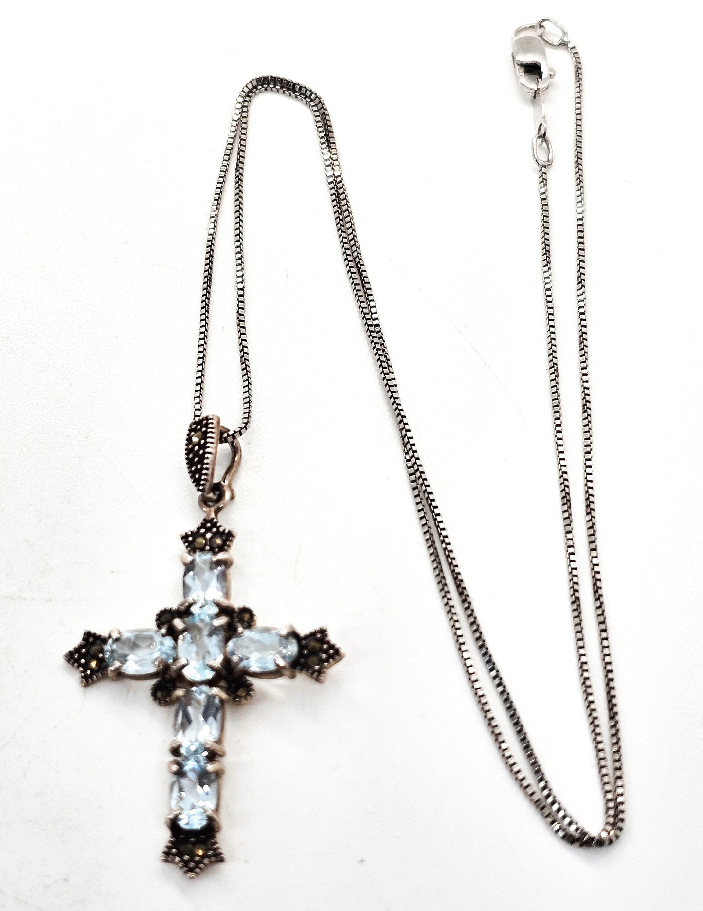 Blue topaz and marcasite sterling silver cross gemstone necklace