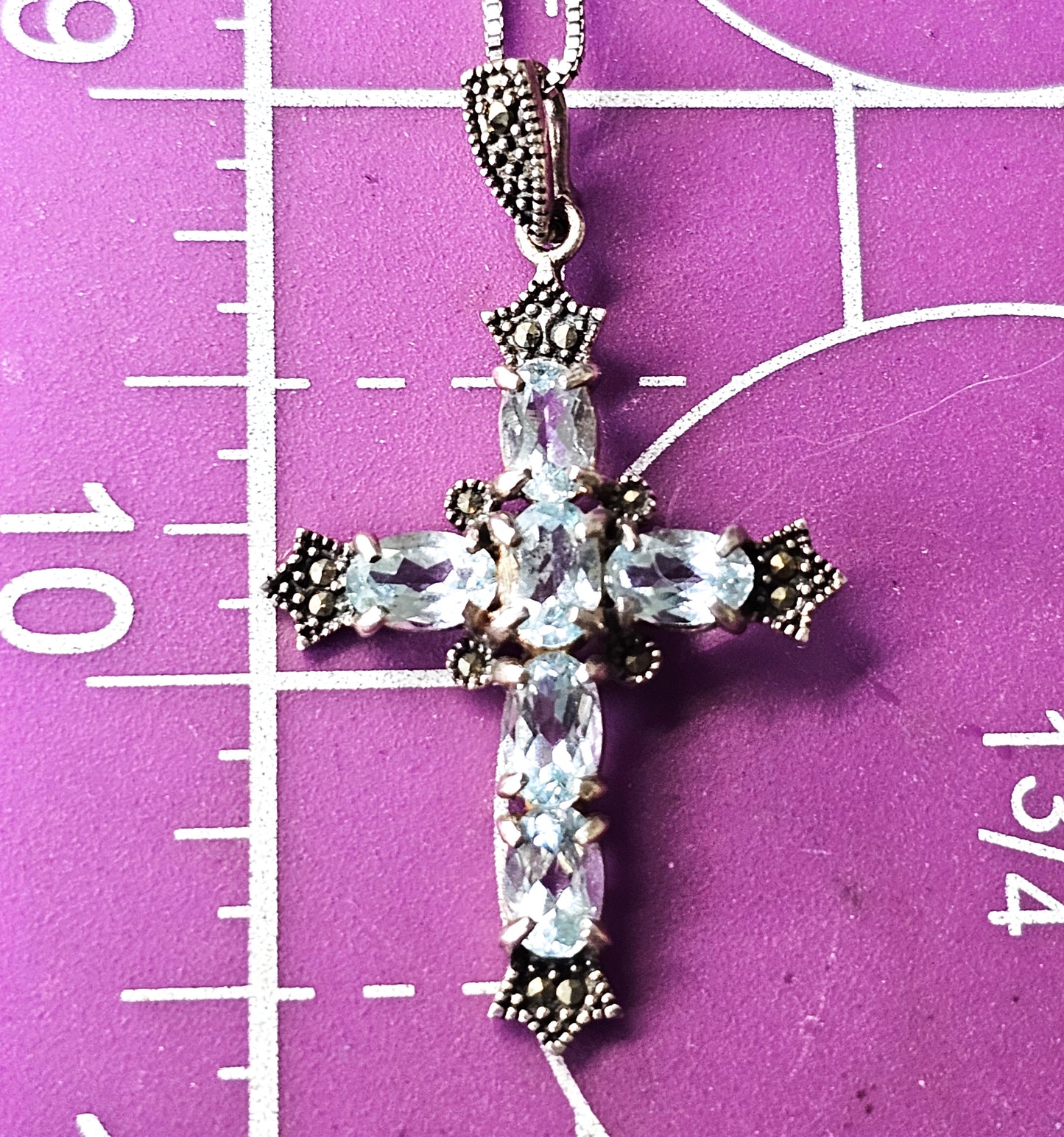 Blue topaz and marcasite sterling silver cross gemstone necklace