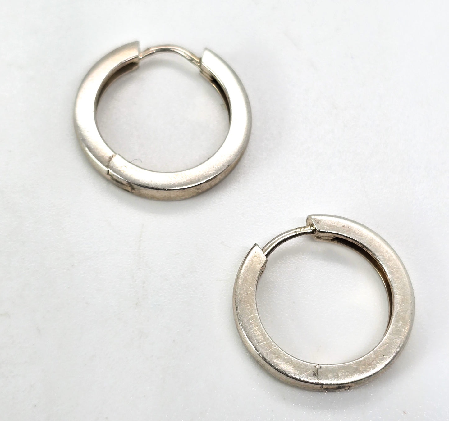 Hinged open vintage small petite sterling silver hoop earrings