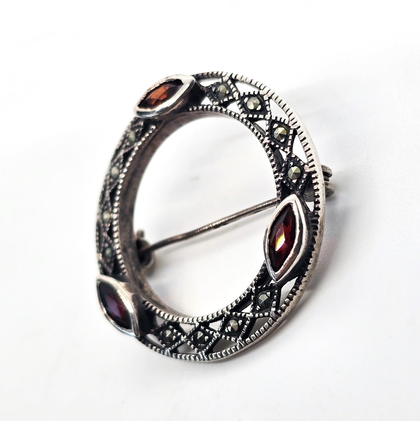 Garnet and marcasite vintage red gemstone and sterling silver circle infinity brooch