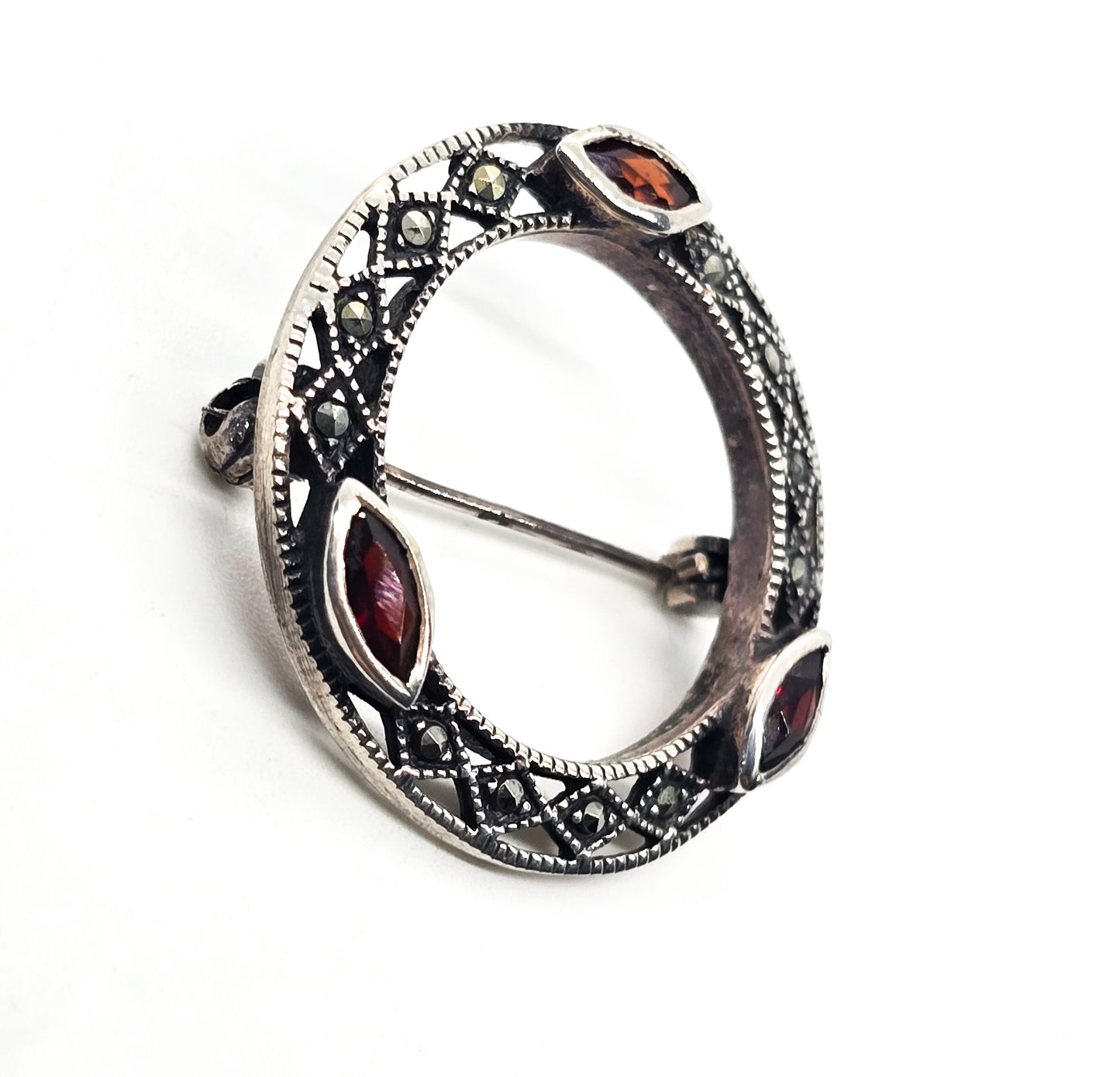 Garnet and marcasite vintage red gemstone and sterling silver circle infinity brooch
