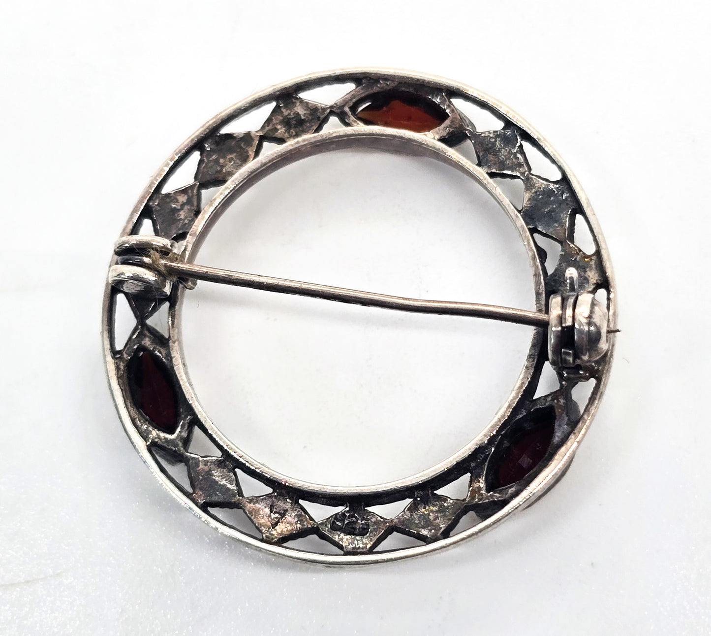 Garnet and marcasite vintage red gemstone and sterling silver circle infinity brooch