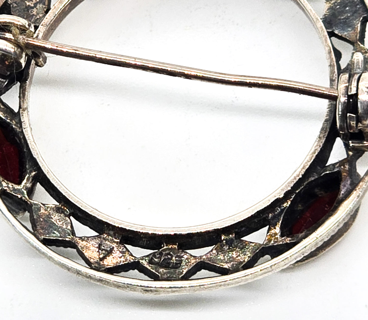 Garnet and marcasite vintage red gemstone and sterling silver circle infinity brooch