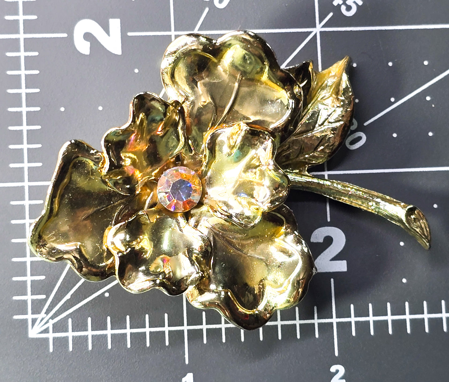 Aurora Borealis rhinestone gold toned flower vintage mid century brooch