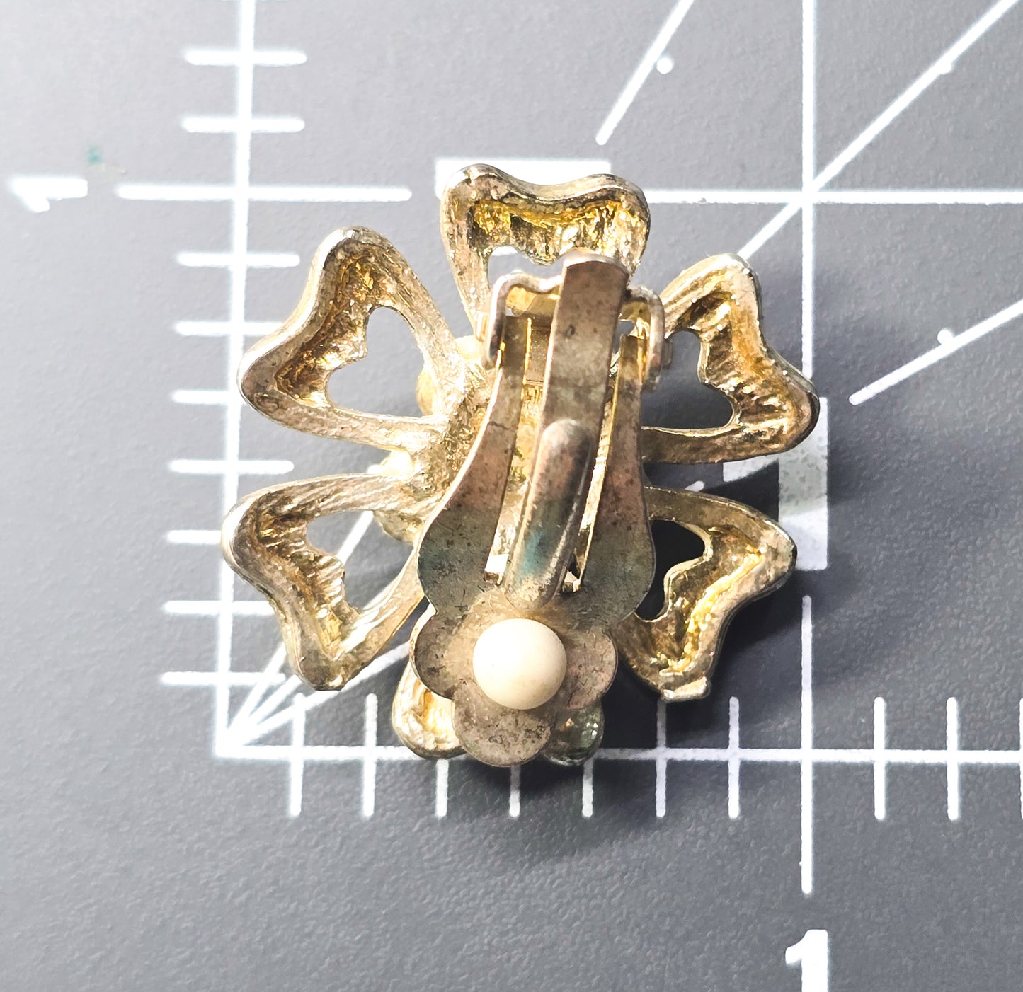 Rainbow aurora borealis rhinestone off white flower clip on vintage earrings