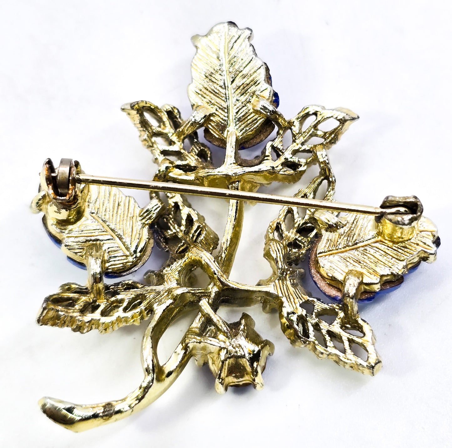 Blue Aurora borealis molded glass leaf rhinestone mid century vintage brooch