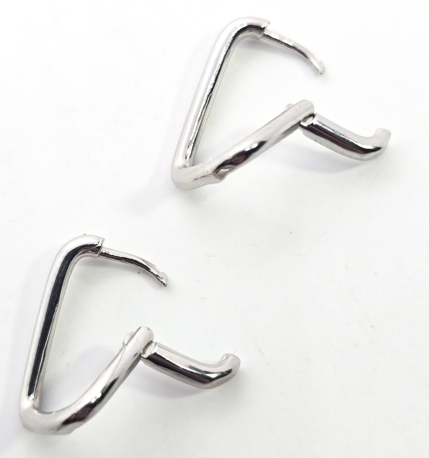 Twisted hoop hinged sterling silver minimalist earrings