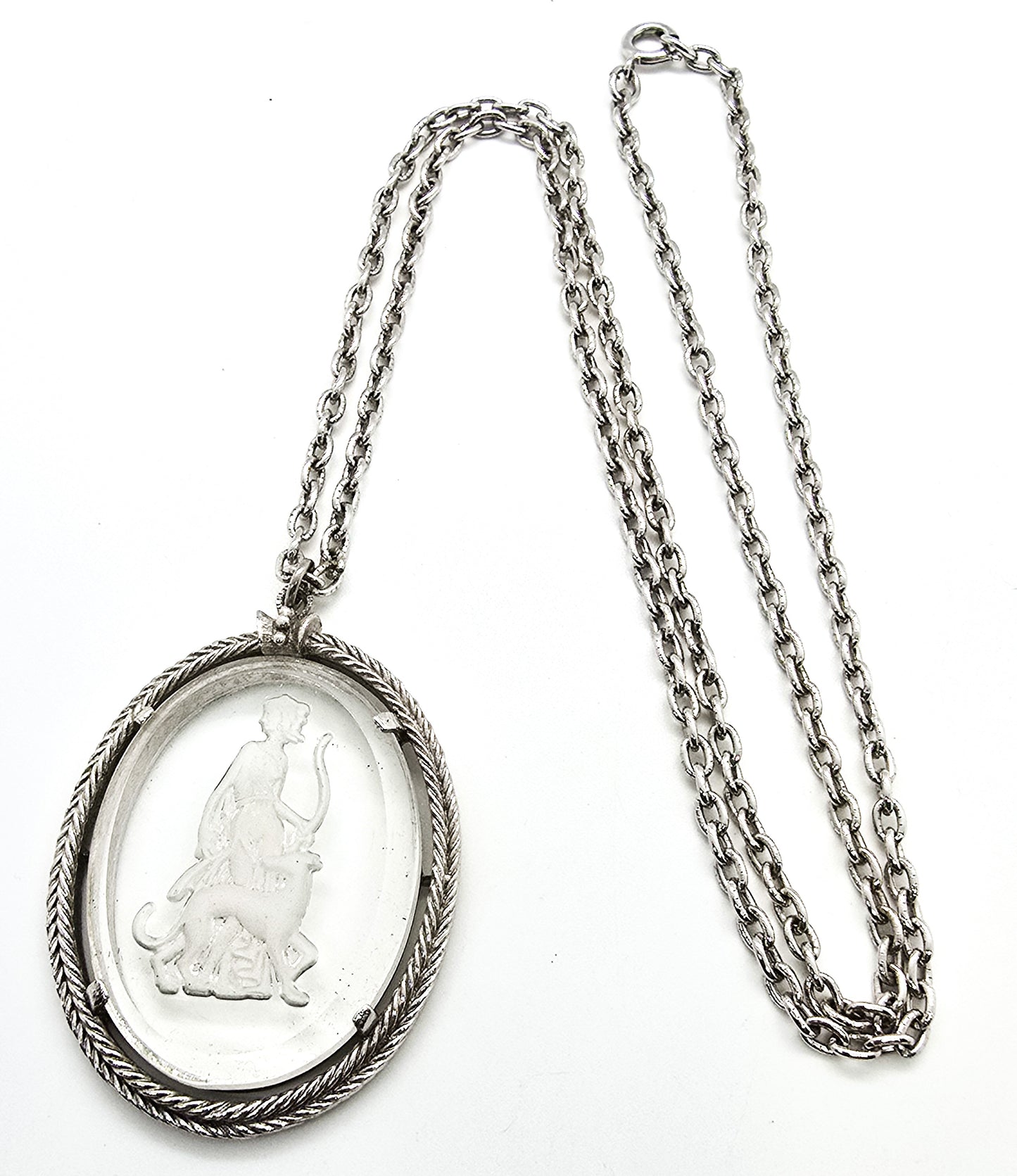 Diana the Huntress 1973 Avon Reversed carved clear glass silver toned vintage necklace