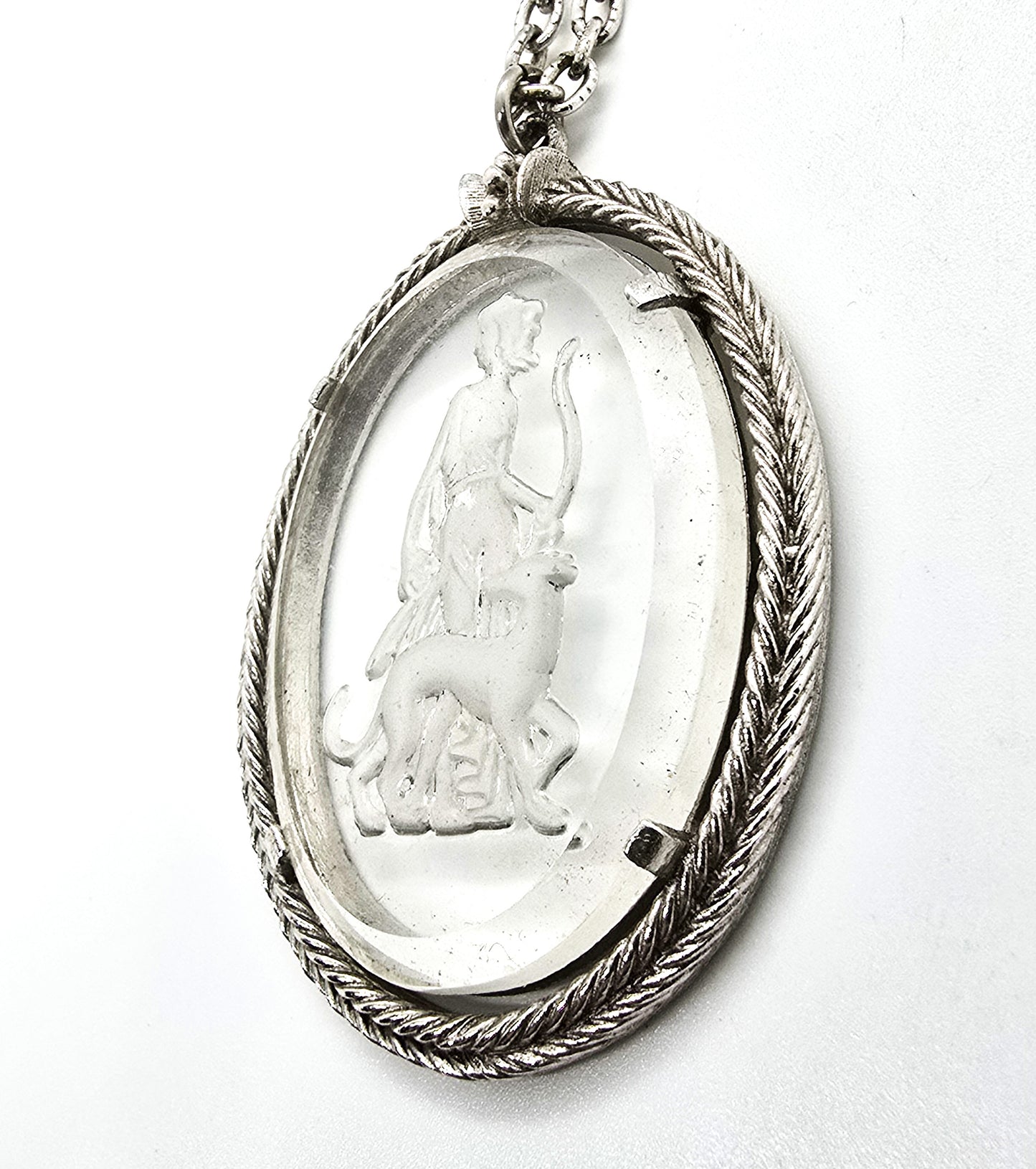 Diana the Huntress 1973 Avon Reversed carved clear glass silver toned vintage necklace