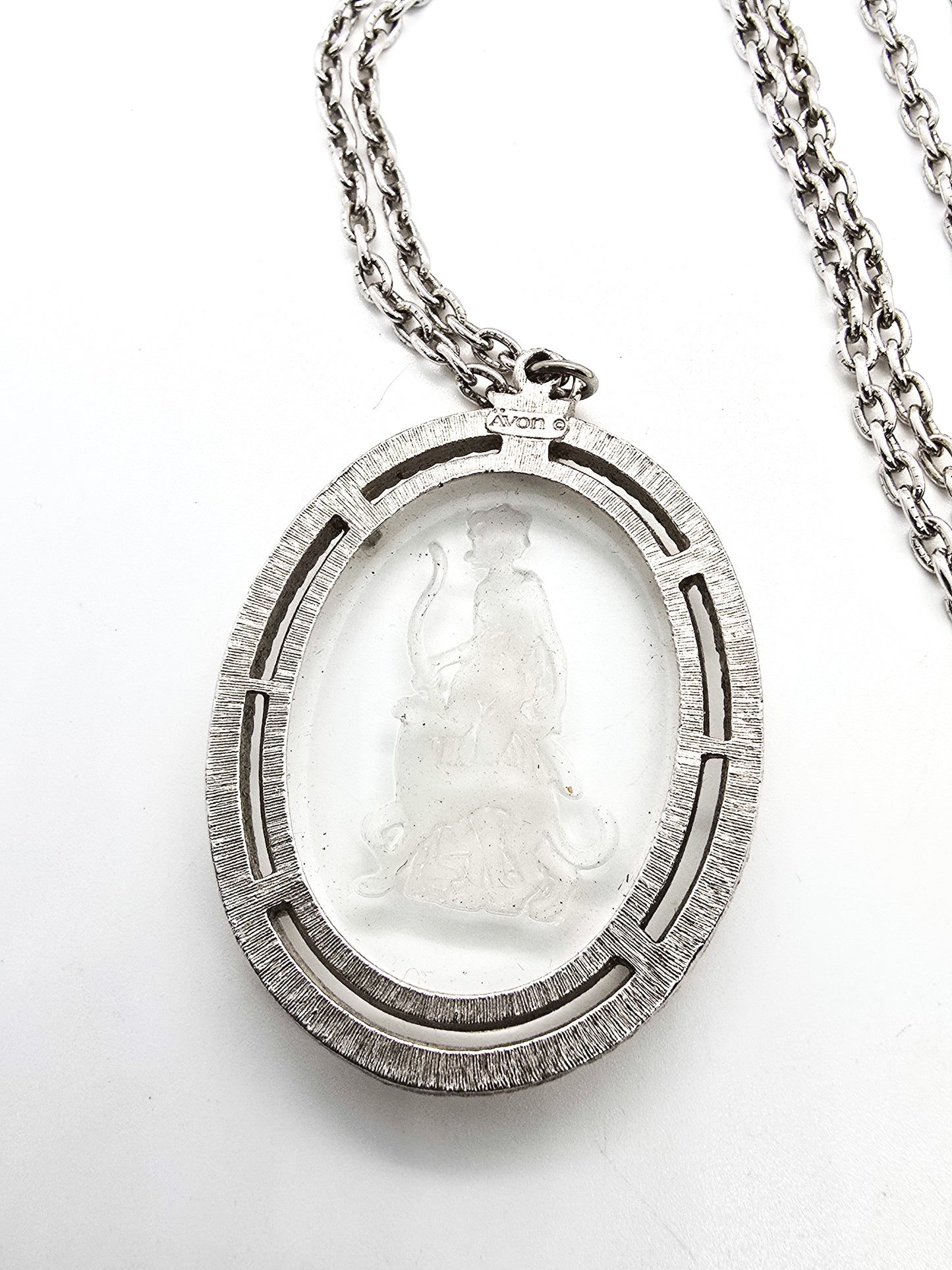 Diana the Huntress 1973 Avon Reversed carved clear glass silver toned vintage necklace