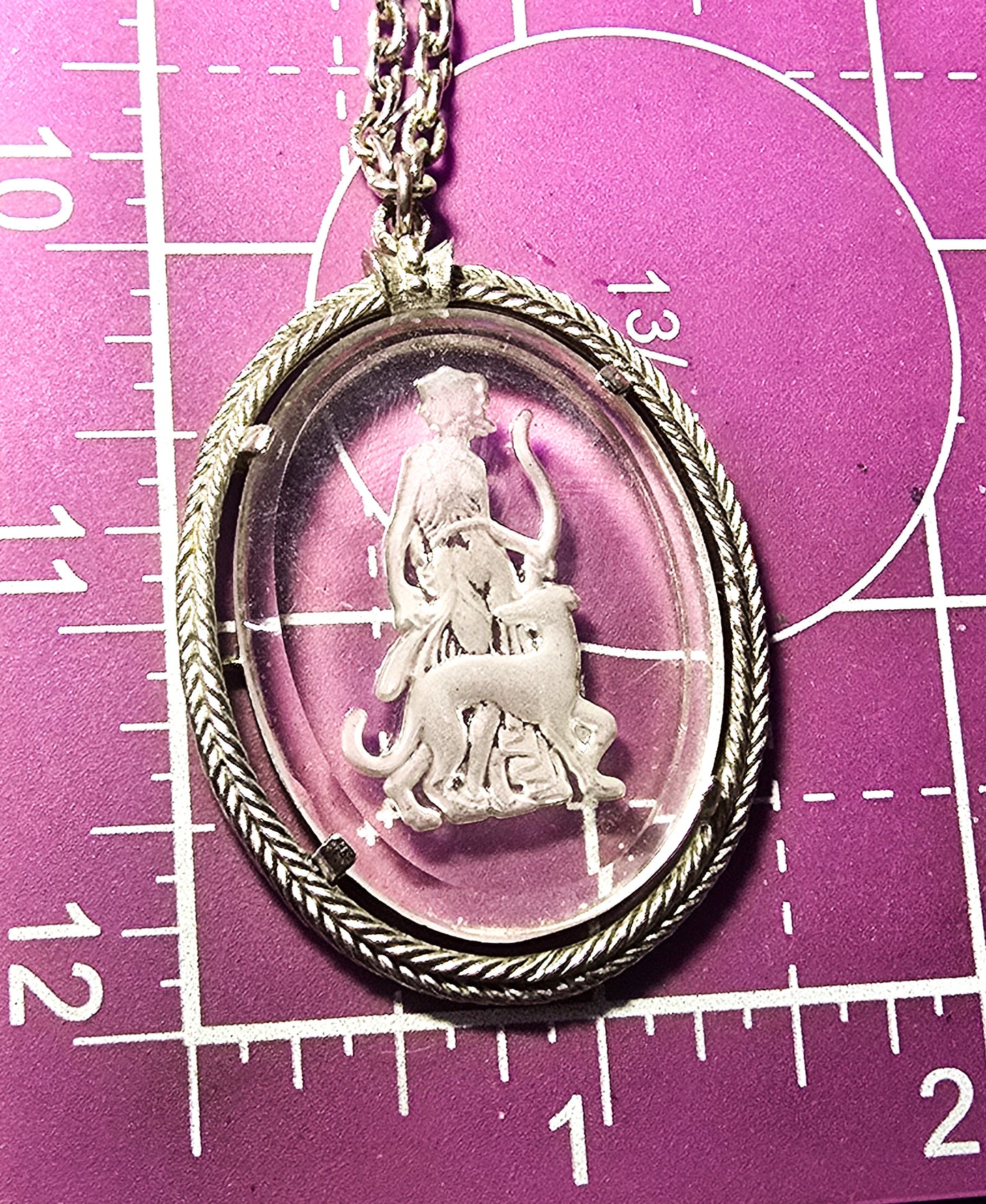 Diana the Huntress 1973 Avon Reversed carved clear glass silver toned vintage necklace