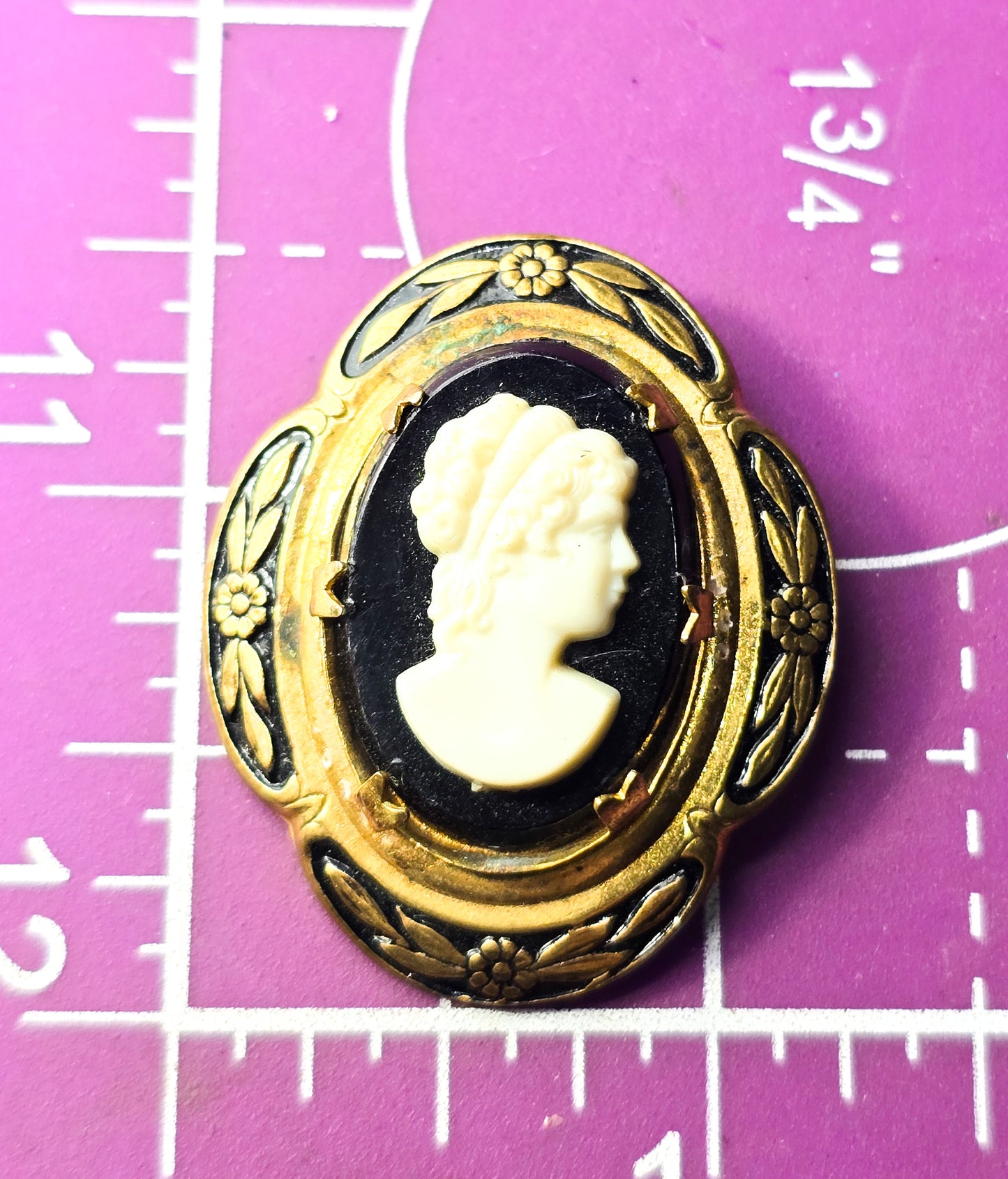 Victorian Revival cameo gold toned black enamel plastic vintage cameo brooch