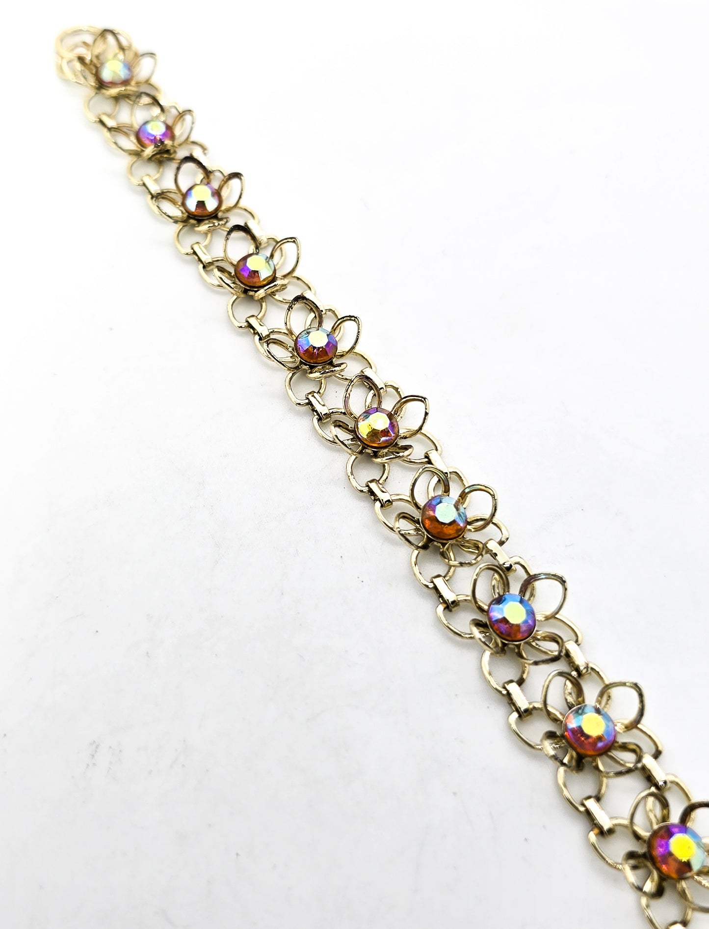 Aurora Borealis rainbow rhinestone flower gold toned bracelet mid century