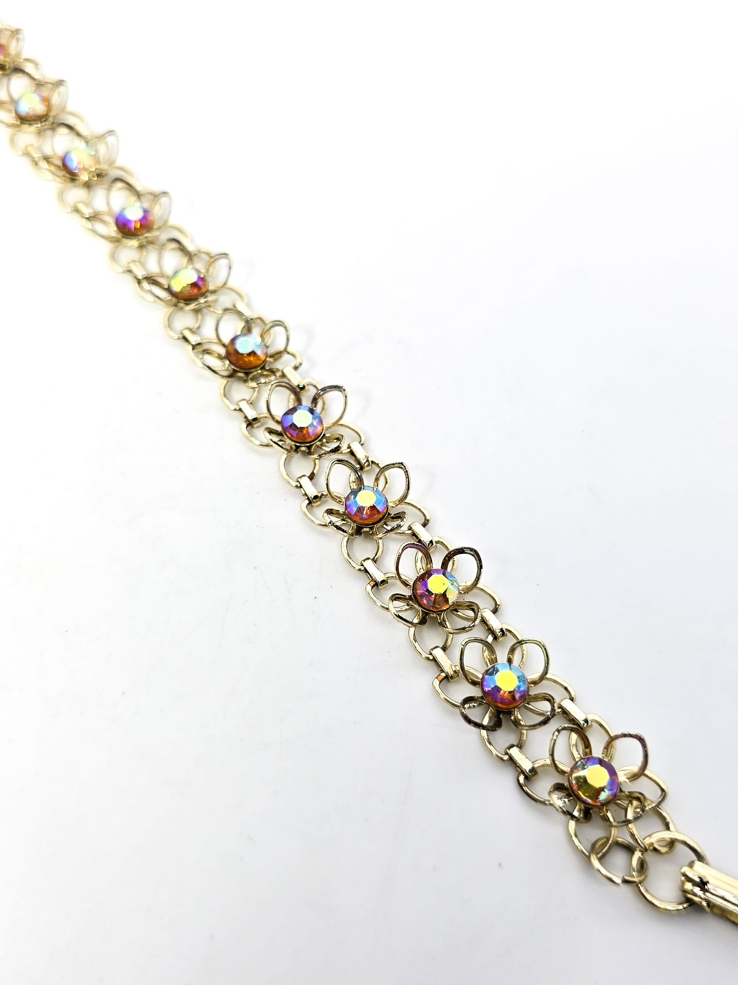 Aurora Borealis rainbow rhinestone flower gold toned bracelet mid century