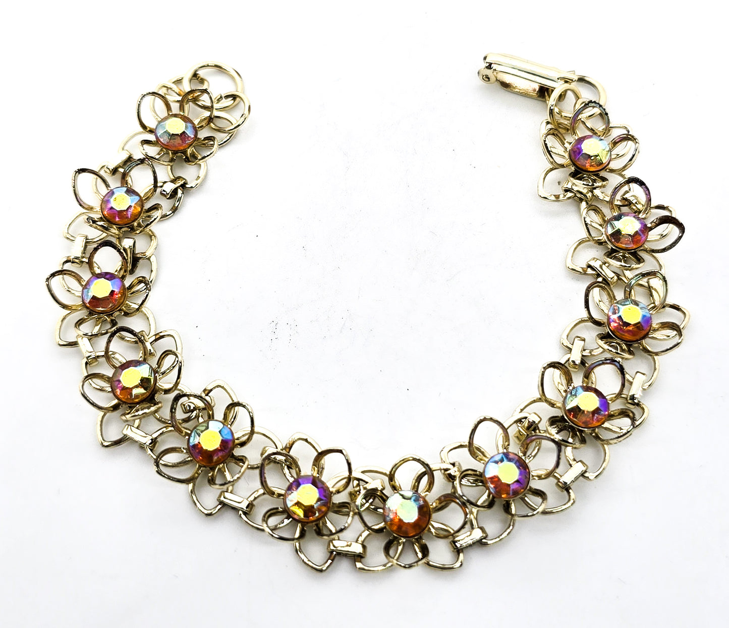Aurora Borealis rainbow rhinestone flower gold toned bracelet mid century