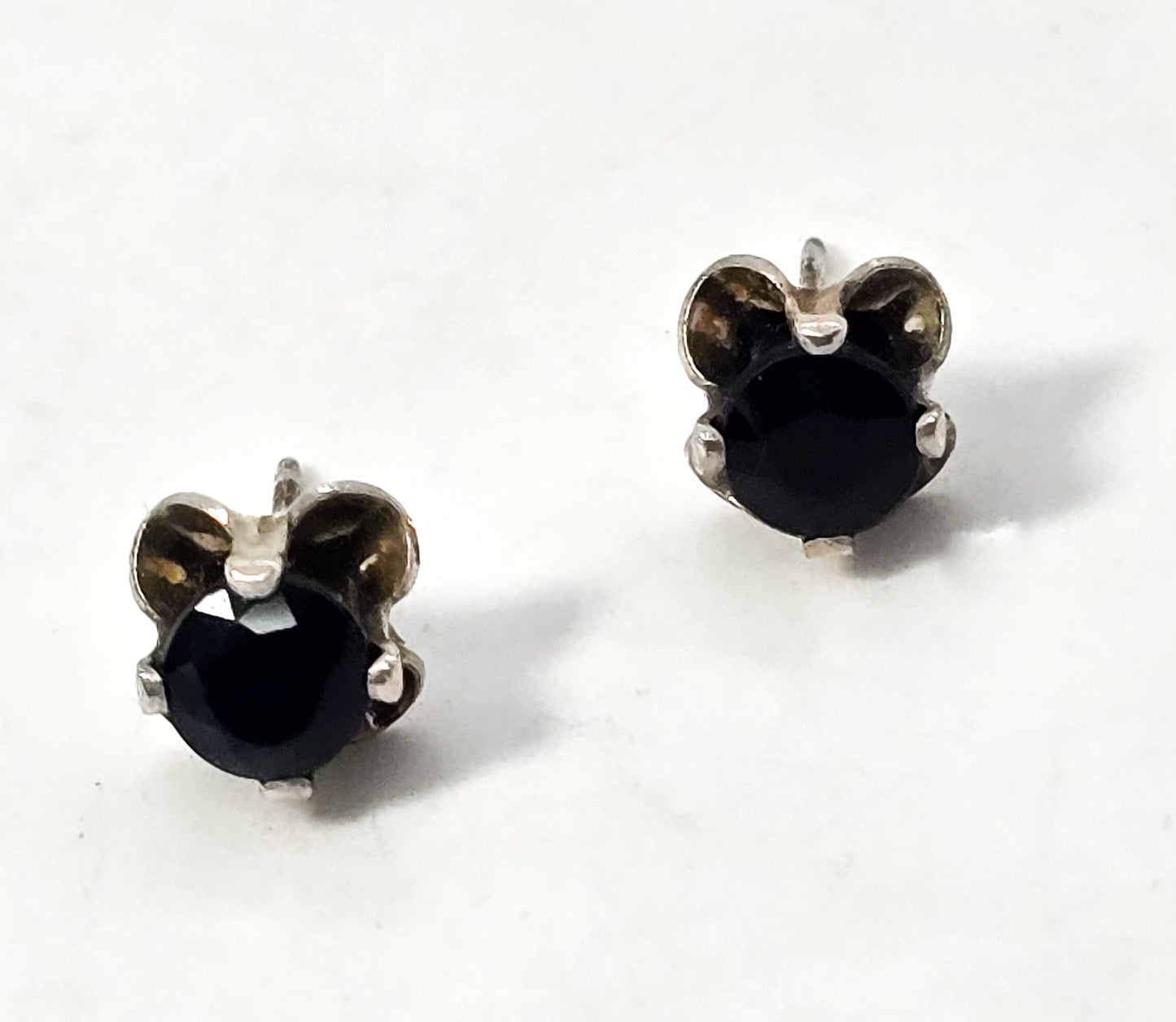 Landstrom's dark blue sapphire 1ct total weight sterling silver stud earrings