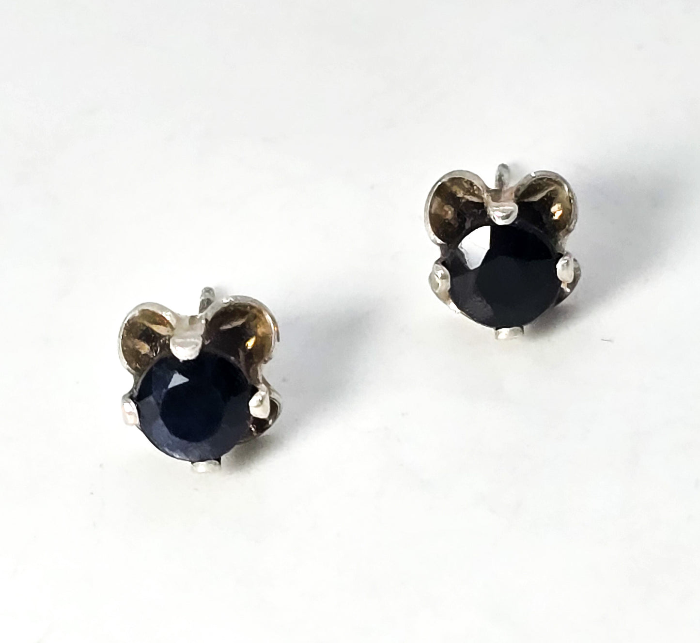 Landstrom's dark blue sapphire 1ct total weight sterling silver stud earrings