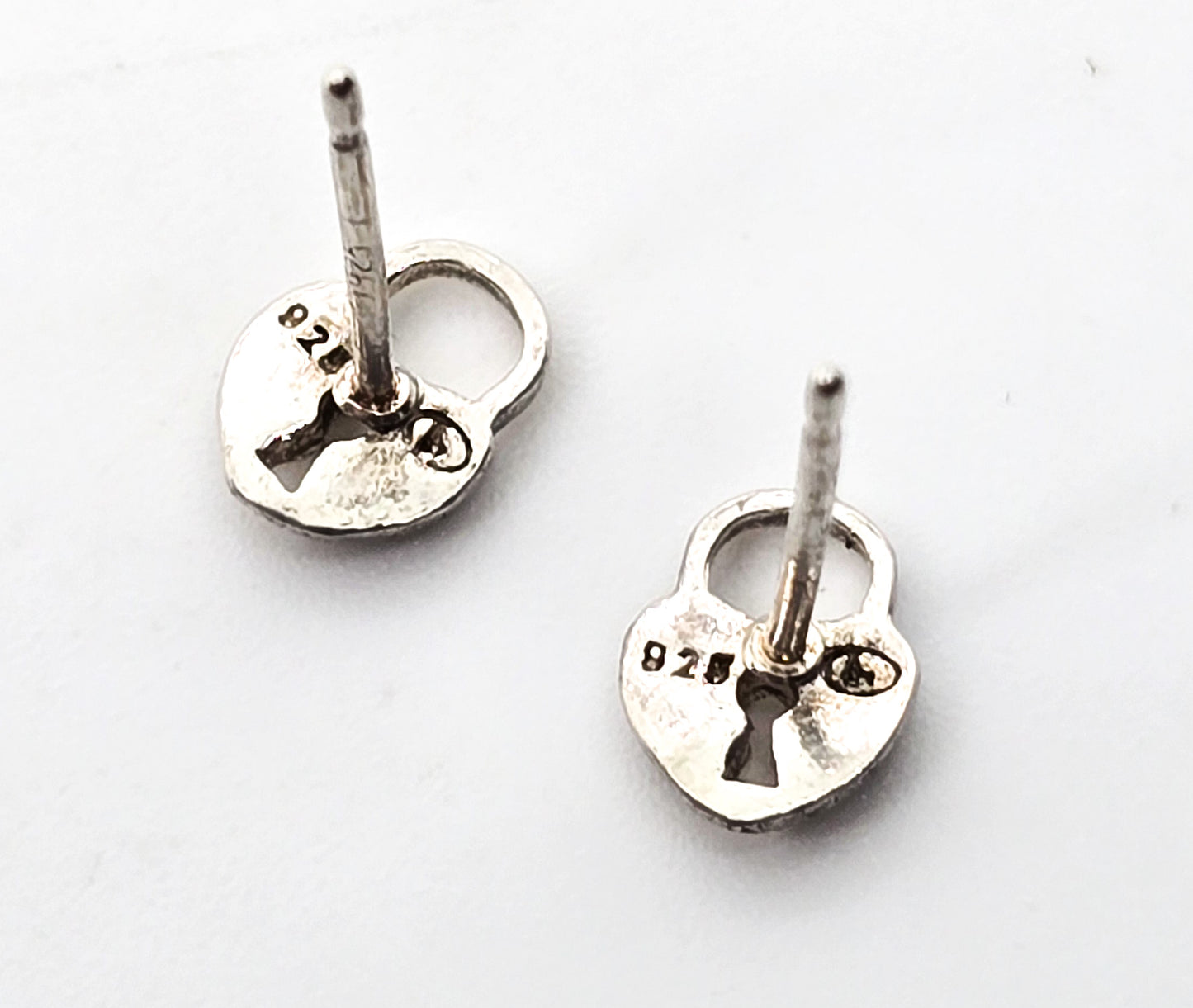 Heart shaped lock petite tiny sterling silver stud earrings