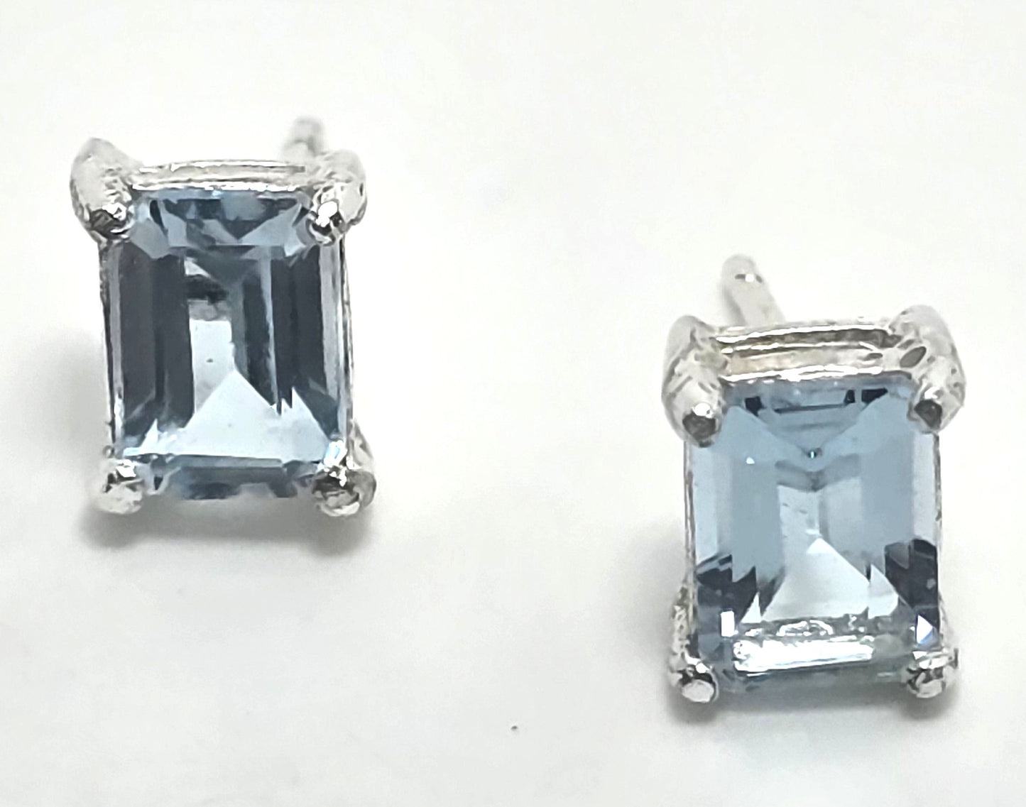 Blue Topaz 1.4 Ct sterling silver emerald cut stud earrings