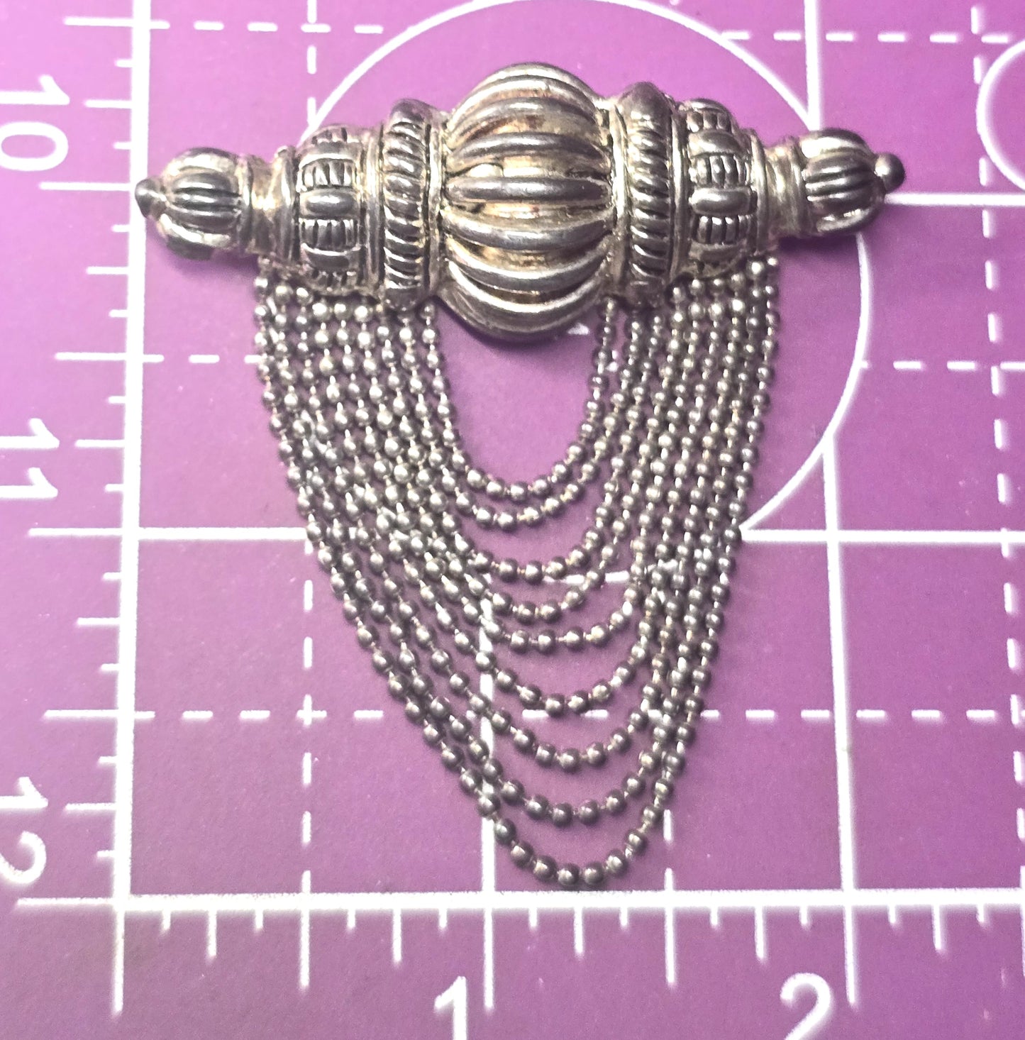 Festoon beaded swag chain silver toned vintage brooch