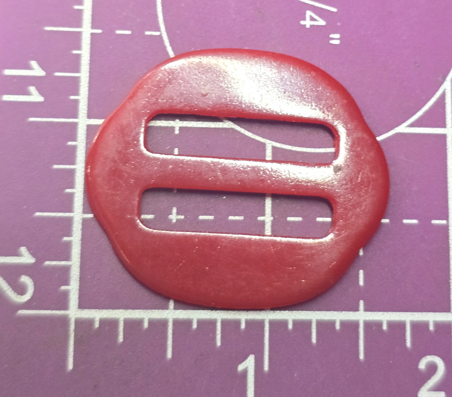 Art Deco Red Bakelite vintage small round scalloped sash belt buckle