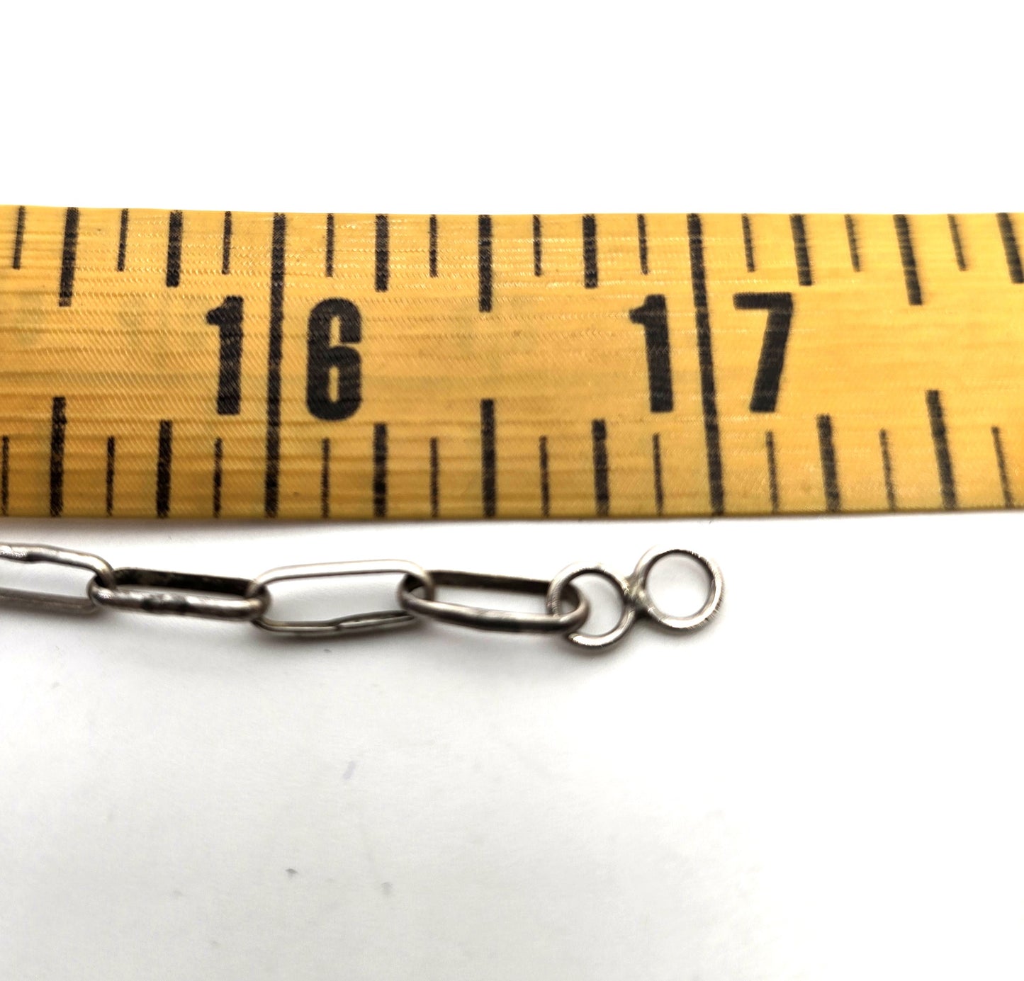 L.L. Dickson Larry and Lorinda Natie American Zuni Sterling sun face necklace