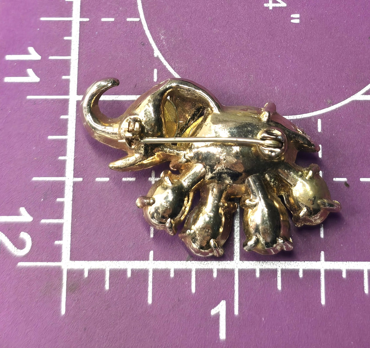 Green uranium glass rhinestone Lucky trunk Elephant UV glow vintage brooch