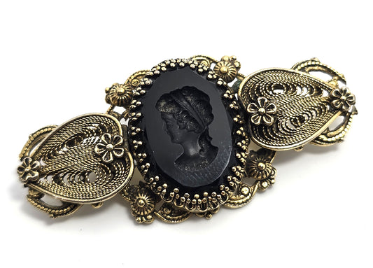 Victorian revival black reverse carved glass cameo gold toned vintage pendant brooch