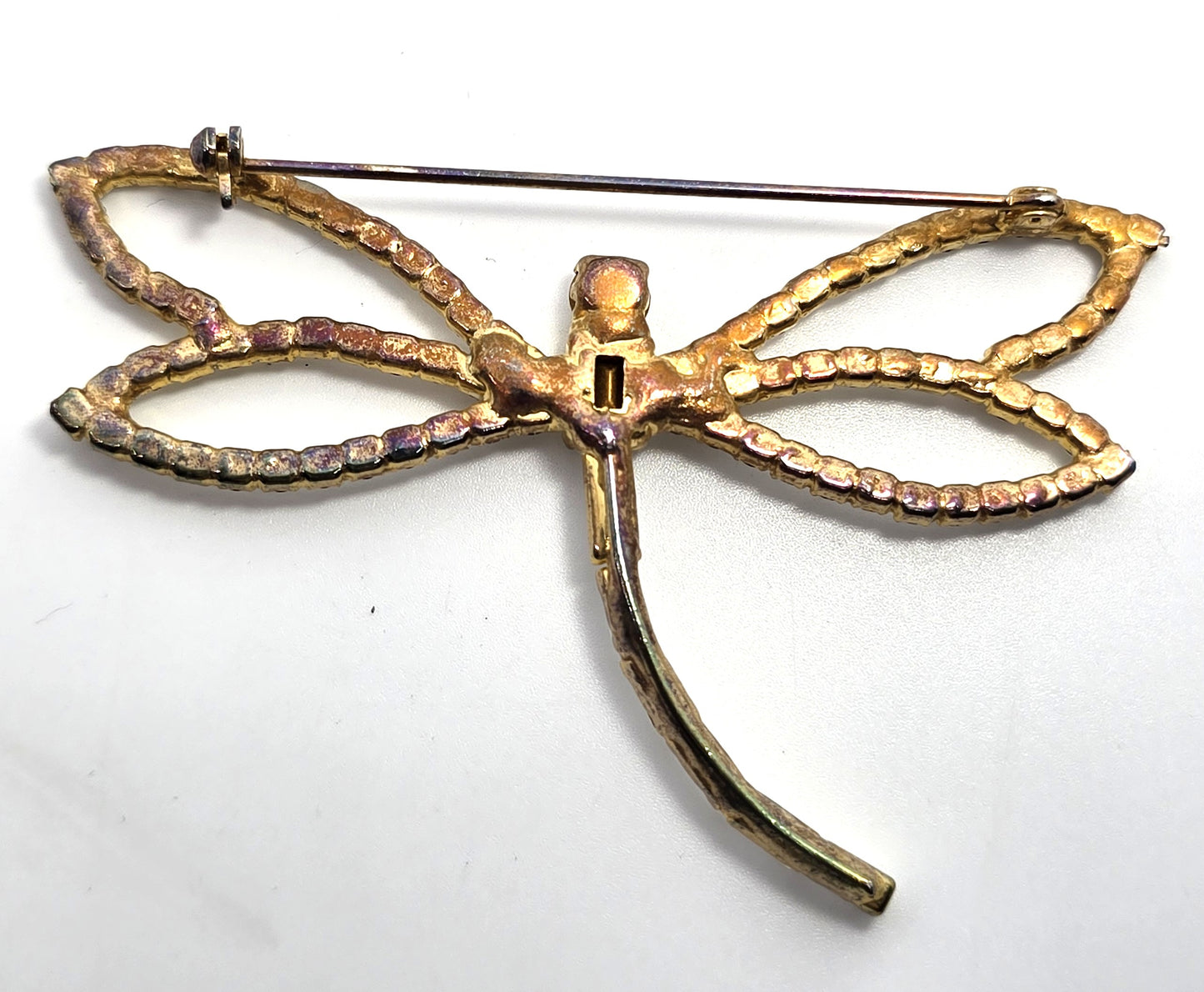 Dragonfly clear rhinestone gold toned open work 3 inch vintage brooch