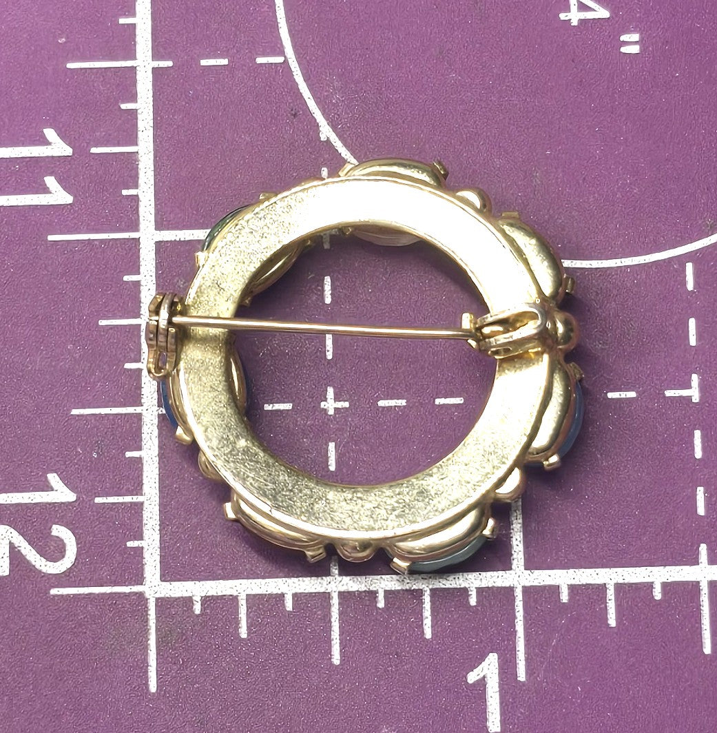 Egyptian Revival molded glass vintage scarab circle infinity brooch