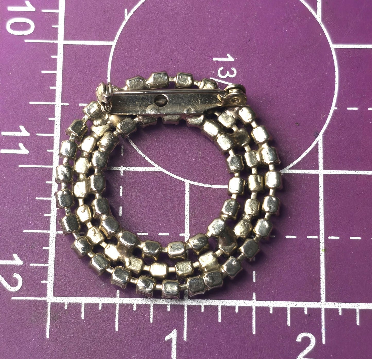 Aurora borealis and red rhinestone wreath vintage mid century circle brooch