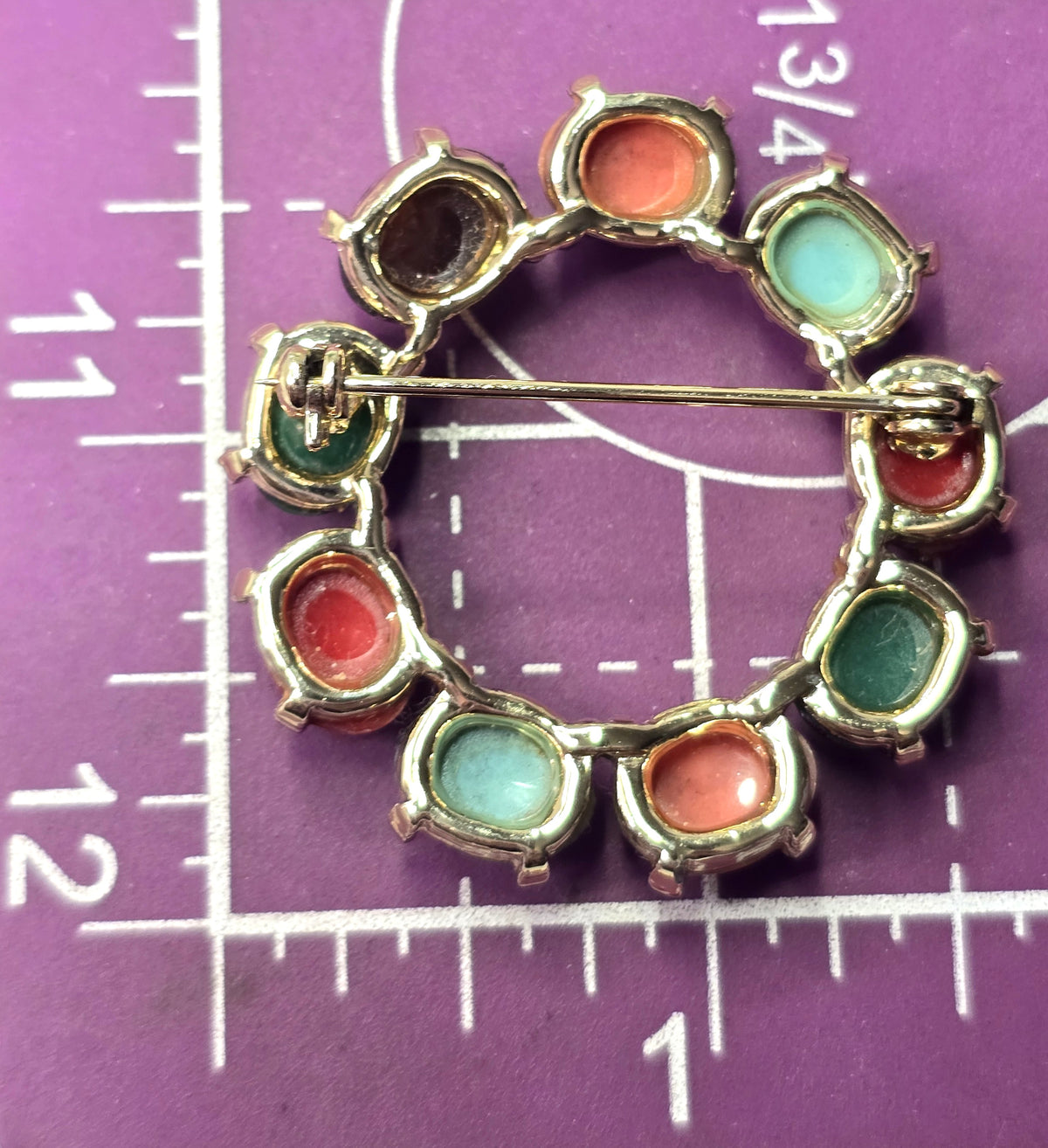 Egyptian Revival molded glass vintage scarab circle infinity brooch