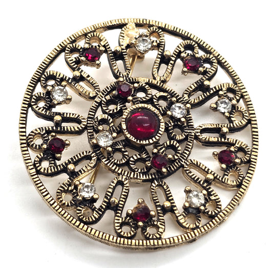 Red and white rhinestone mandala vintage mid century holiday circle brooch
