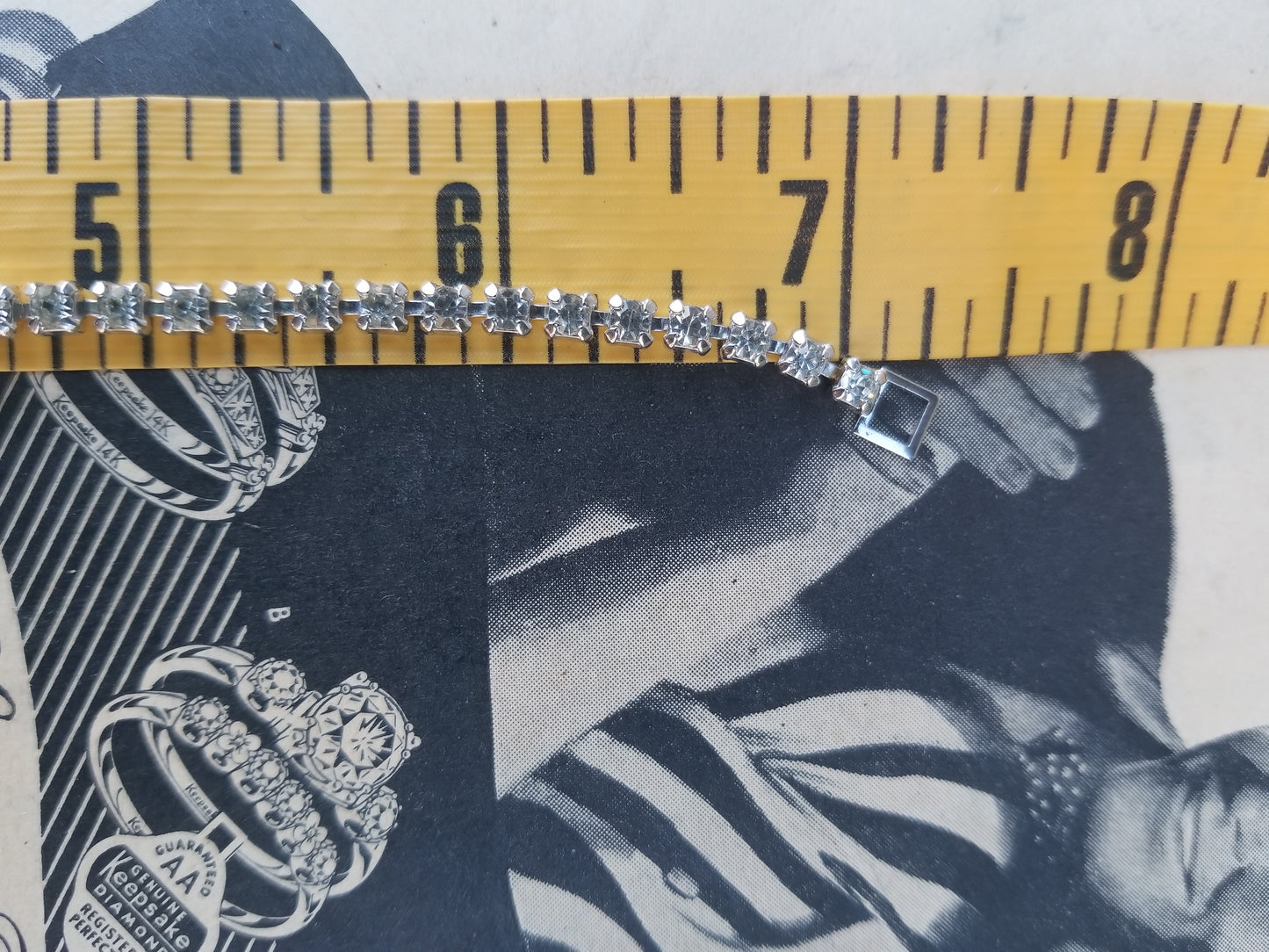 Stunning vintage clear rhinestone tennis bracelet with teardrop accents