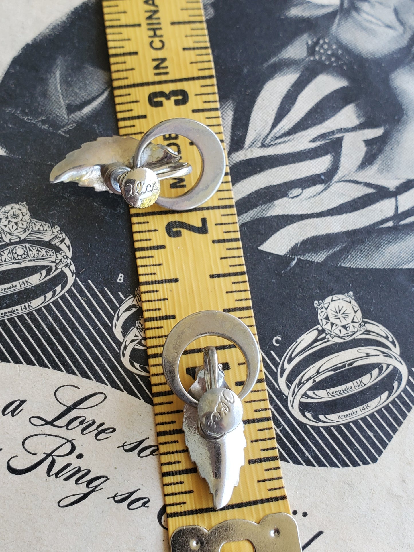 Alice signed screw back rhinestone leaf vintage earrings.