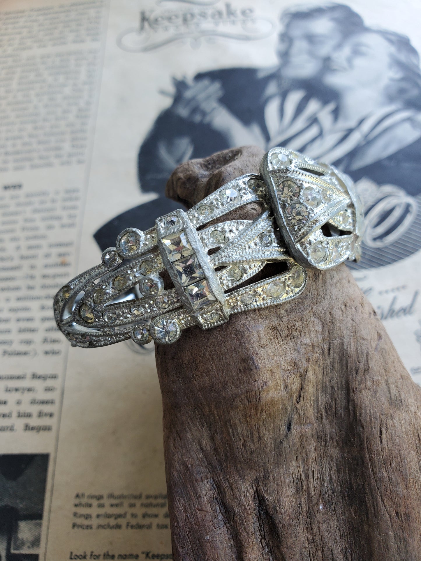 Art Deco pot metal pave set paste rhinestone clamper bracelet with Princess cut accents